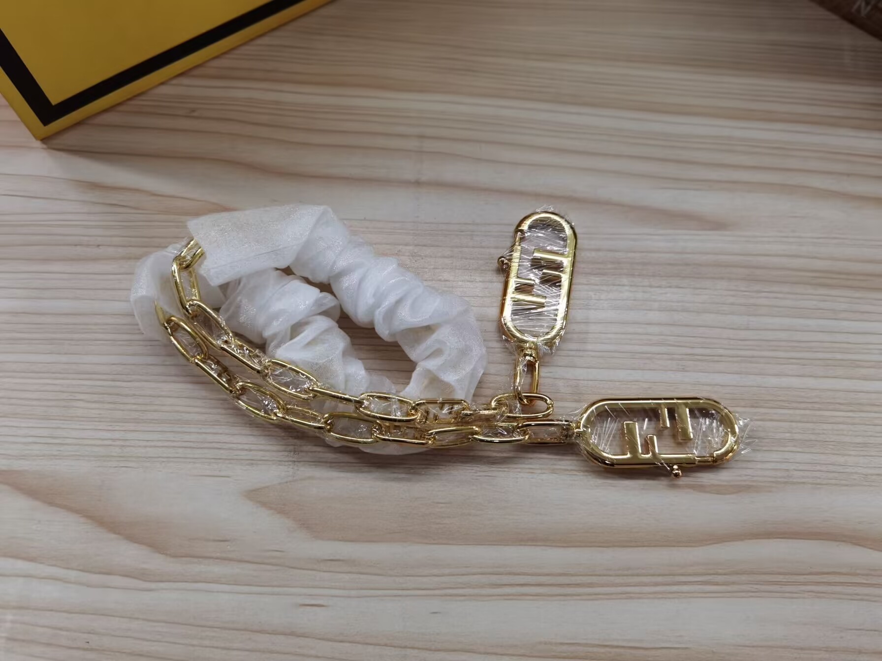 F**di gold chain