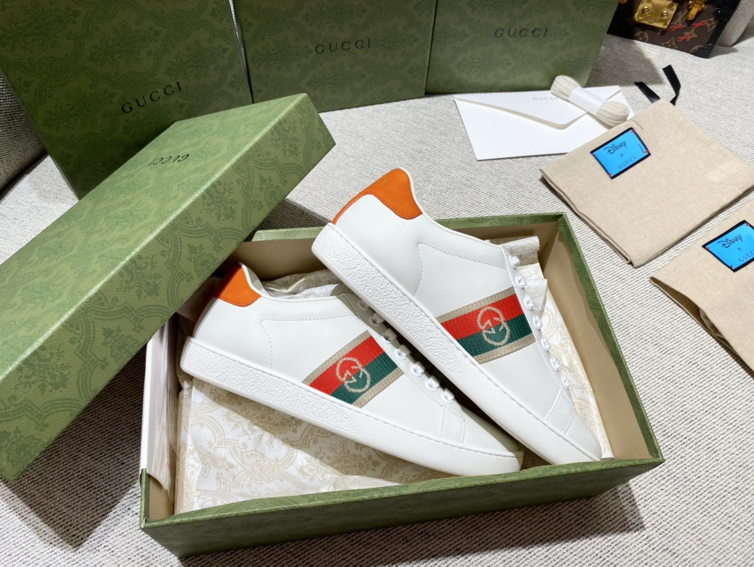 G*u*i sneakers