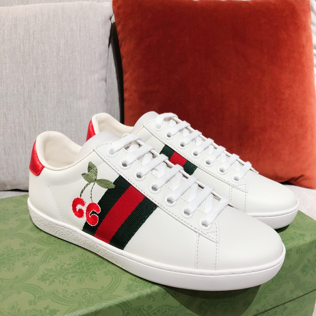 G*u*i sneakers
