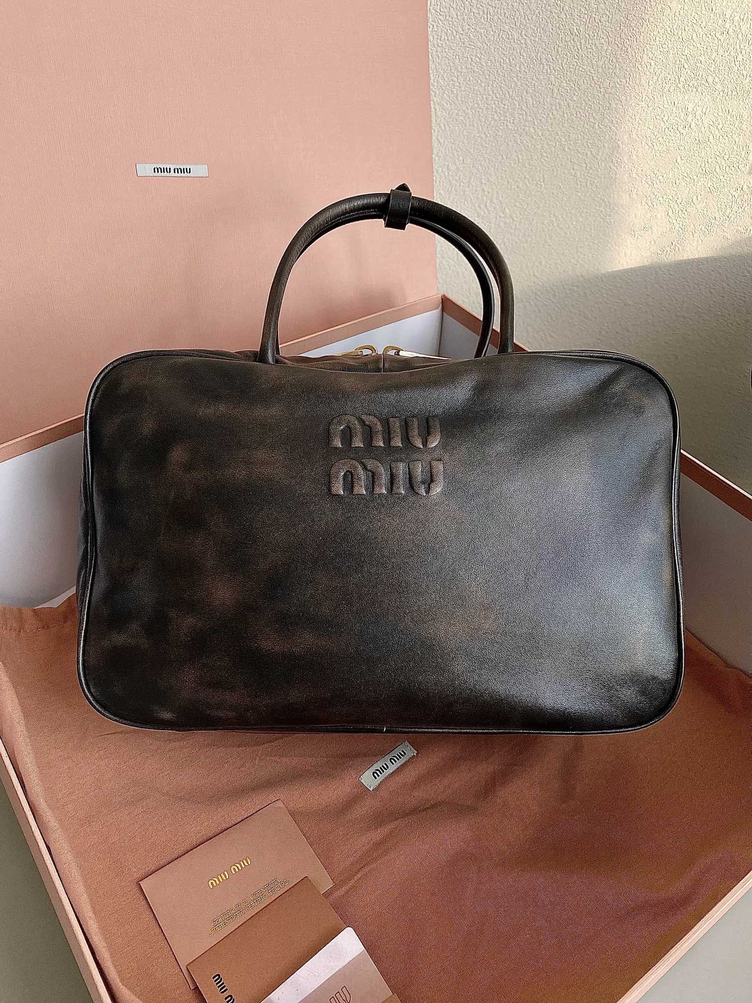 M*um*u bowling bag-34x23x12cm