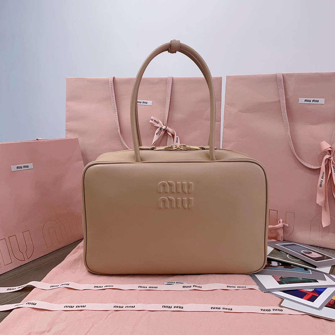 M*um*u leather top handbag-34x23x12cm