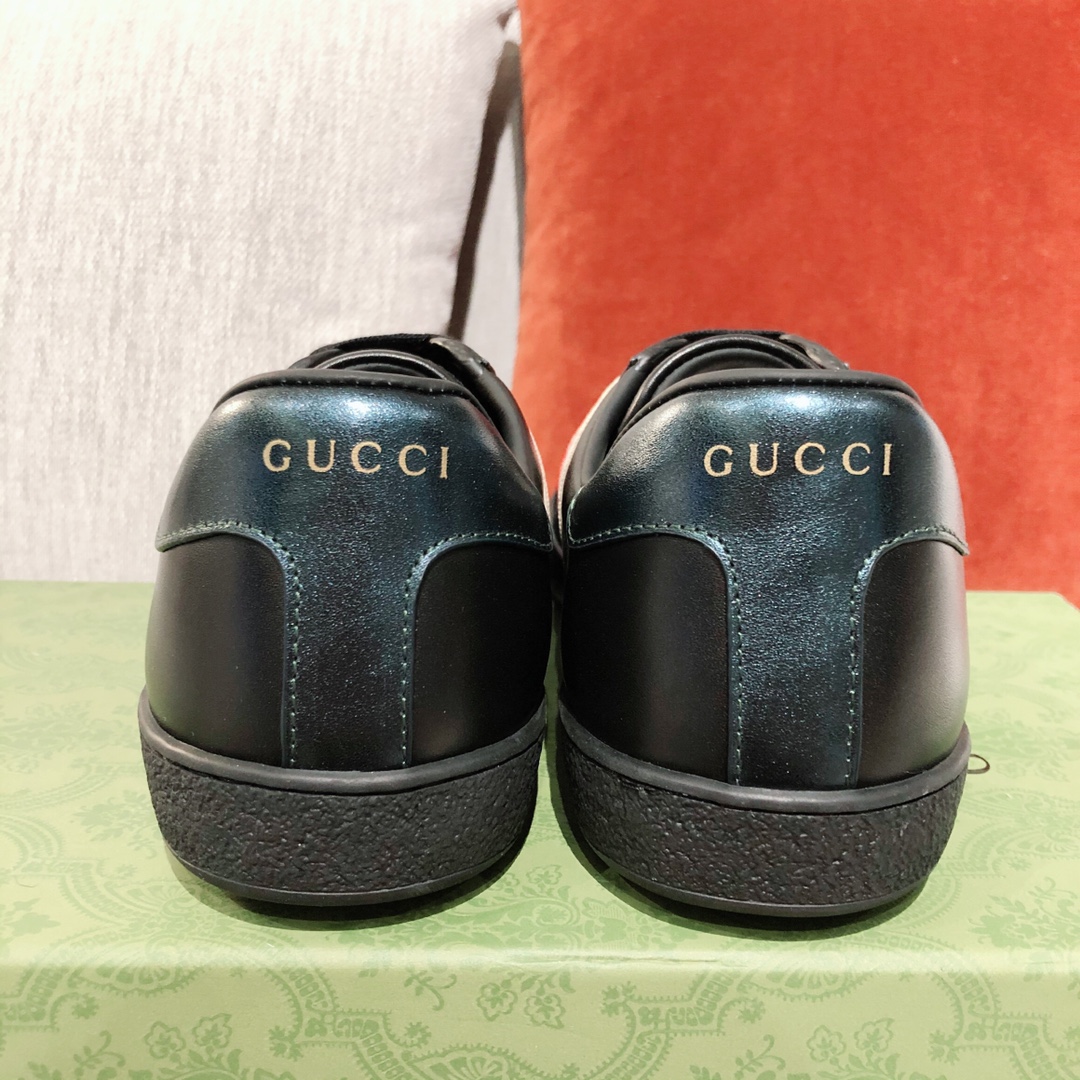 G*u*i sneakers