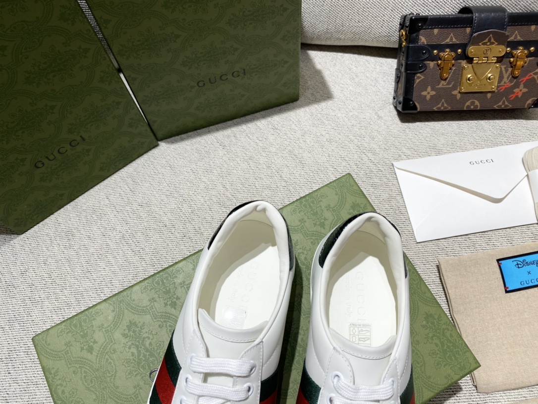 G*u*i sneakers