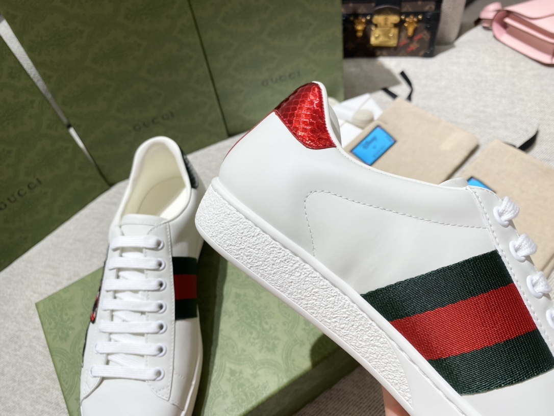 G*u*i sneakers