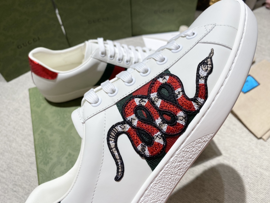 G*u*i sneakers