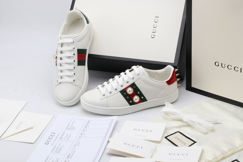 G*u*i sneakers