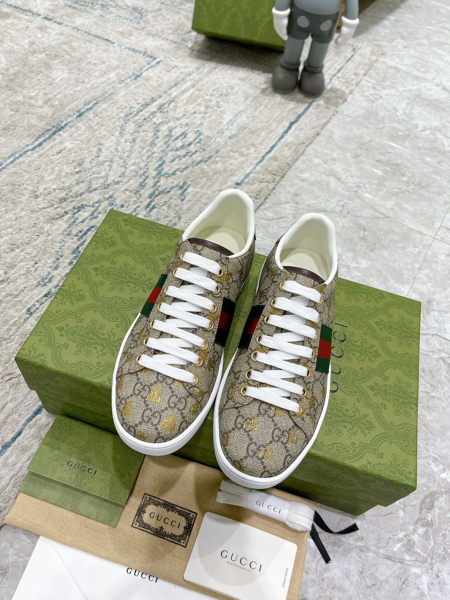 G*u*i sneakers