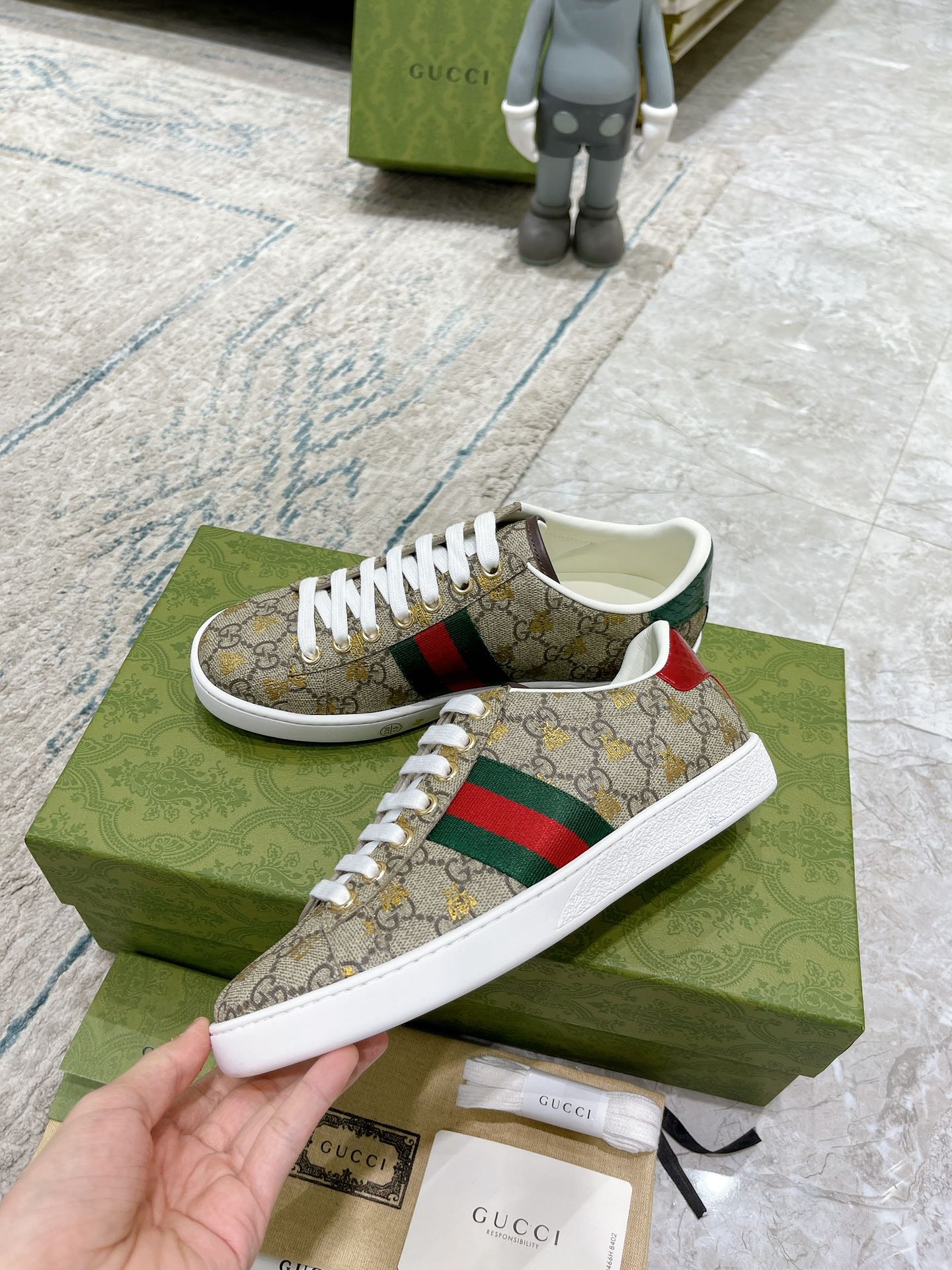 G*u*i sneakers