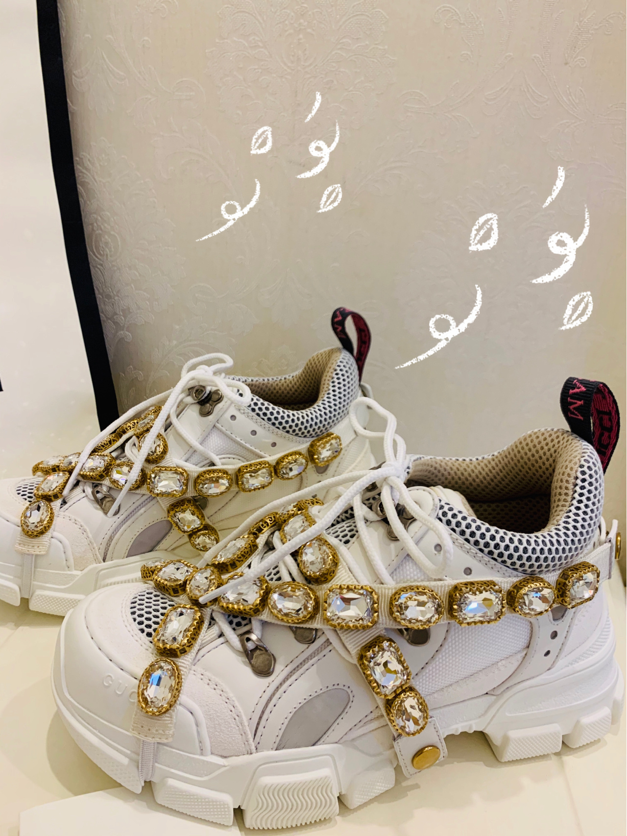 G*u*i sneakers