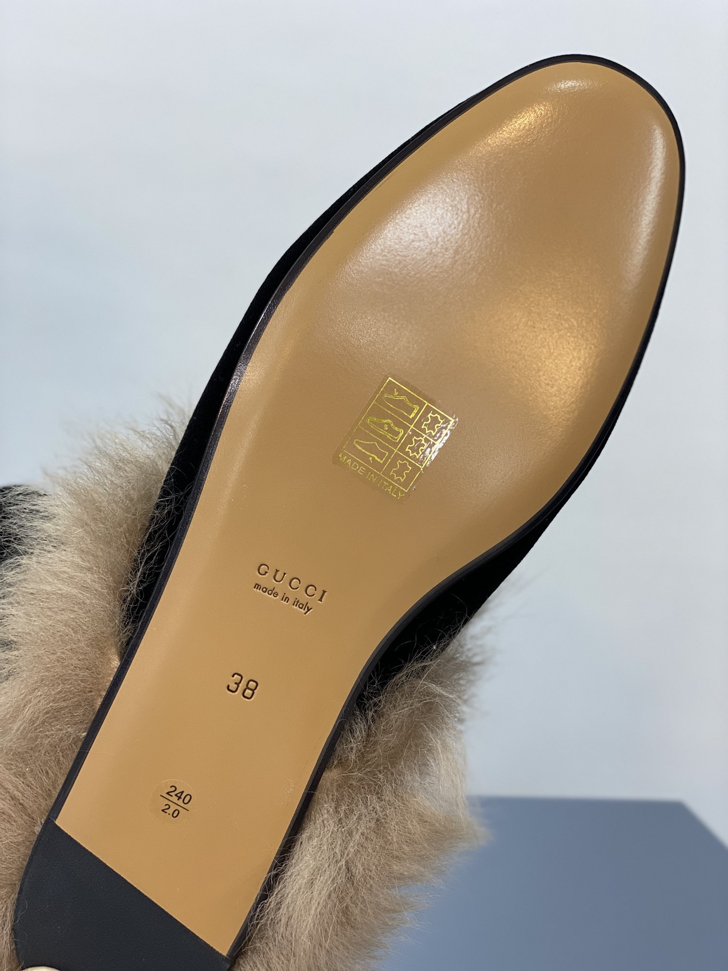 G*u*i loafers