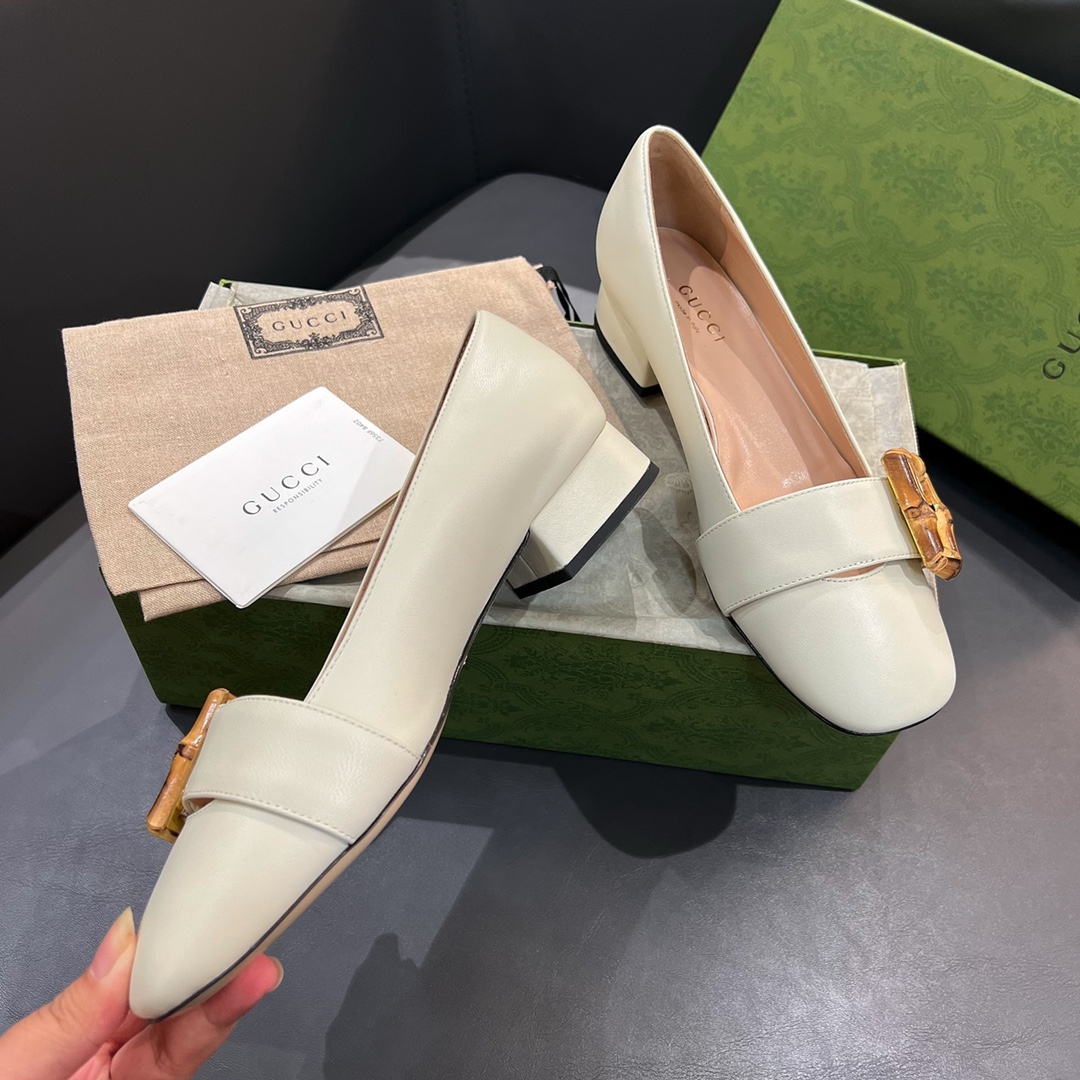 G*u*i loafers