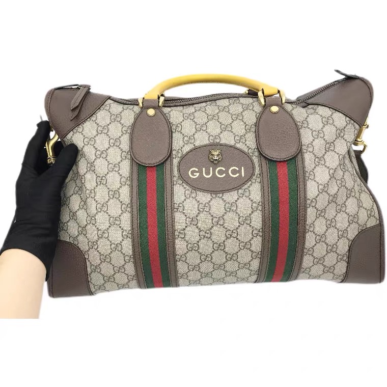 G*u*i ophidia travel bag