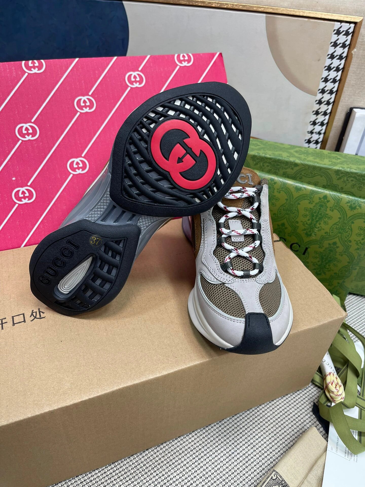 G*u*i sneakers