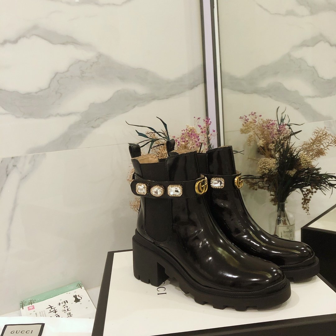 G*u*i boots