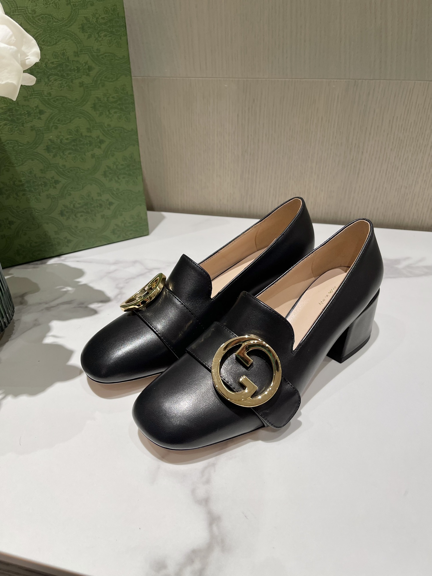 G*u*i loafers