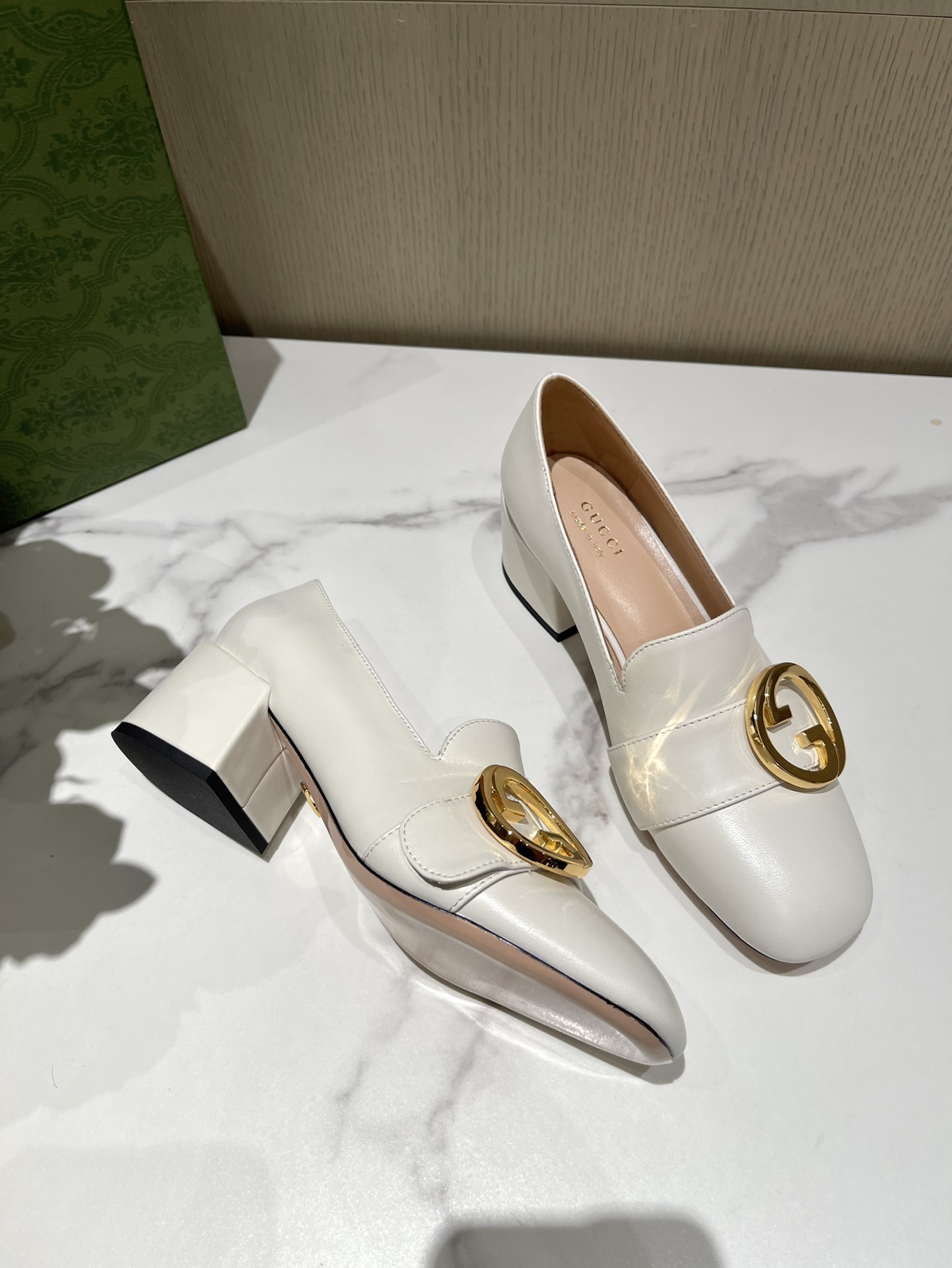G*u*i loafers