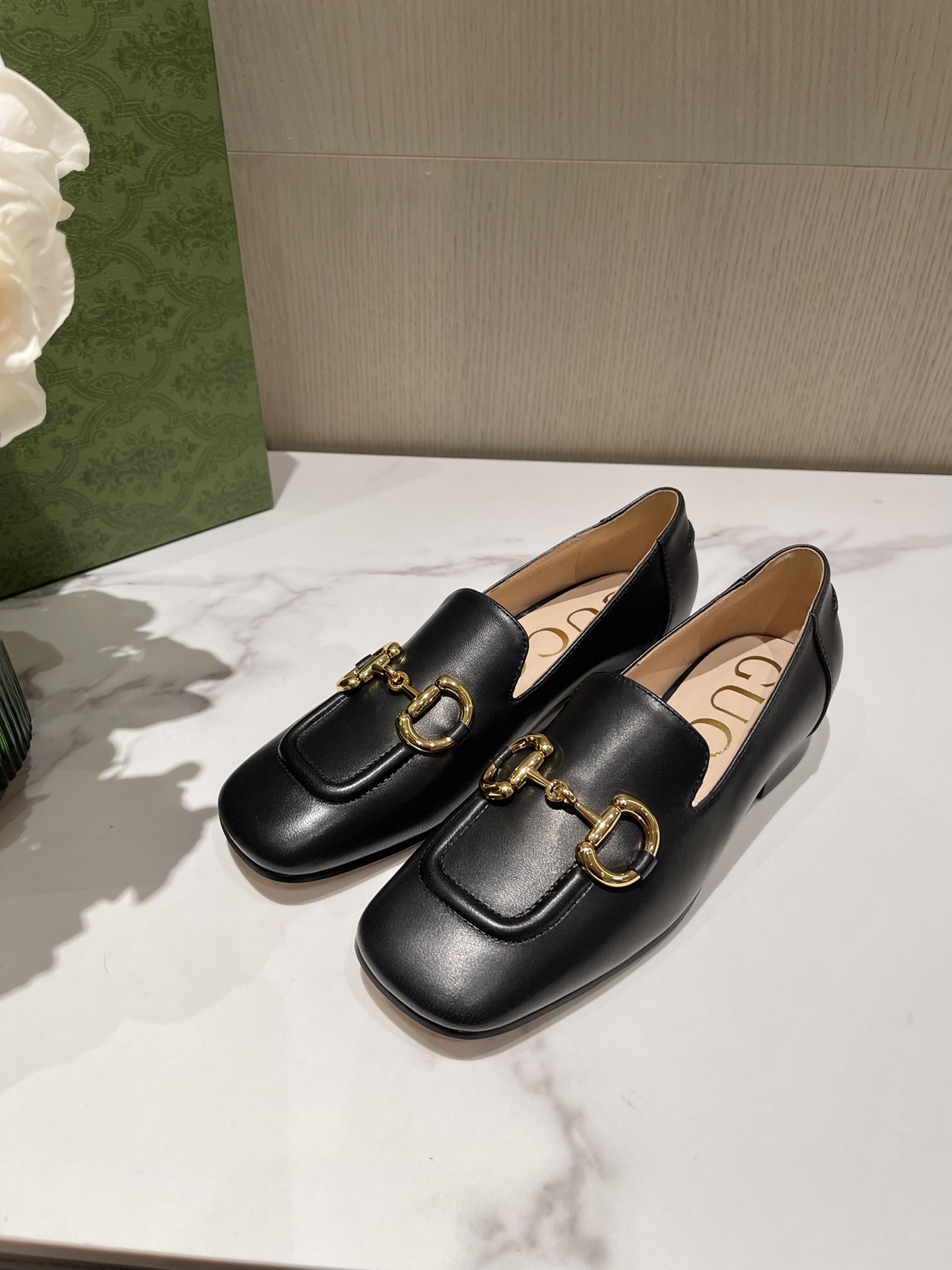 G*u*i loafers