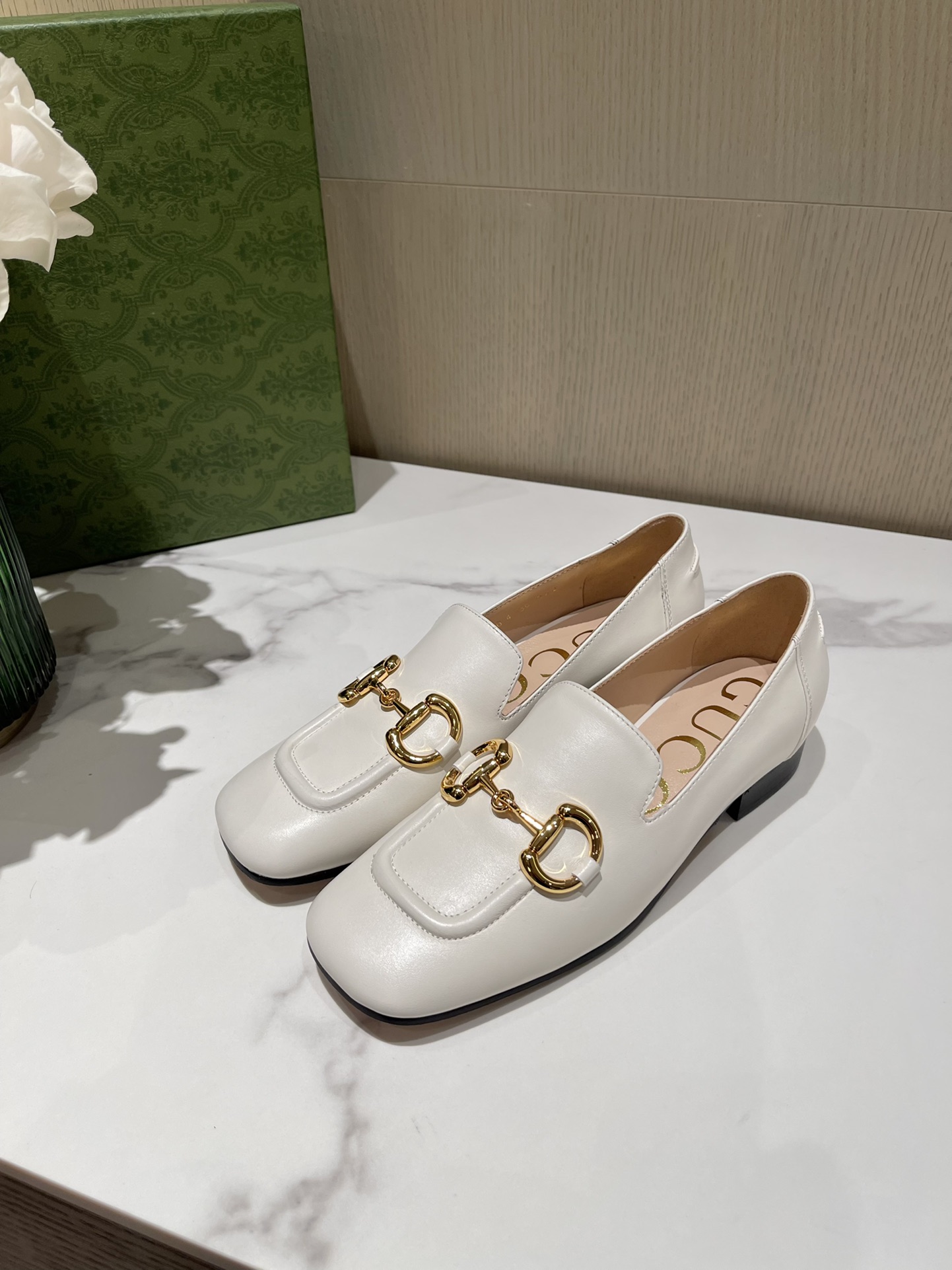 G*u*i loafers