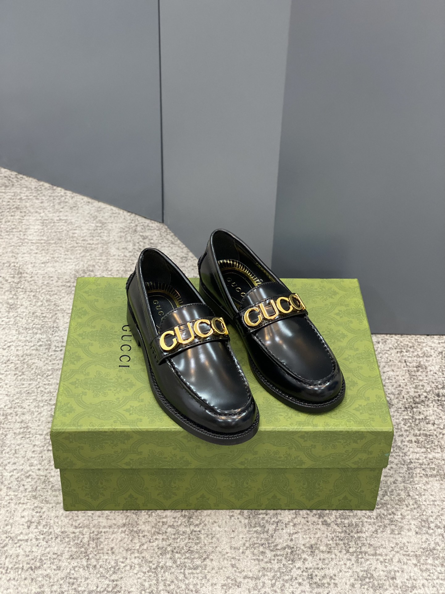G*u*i loafers