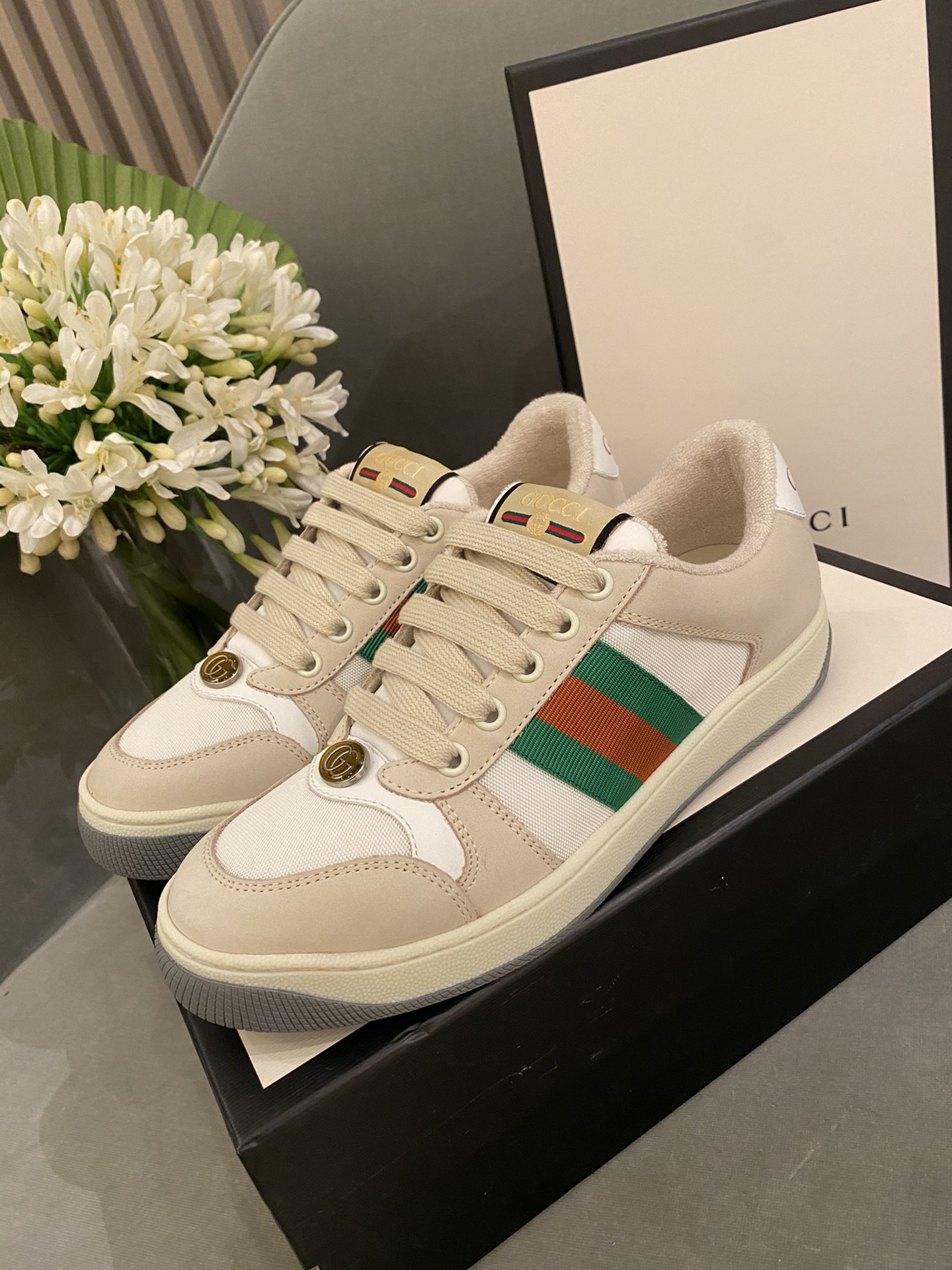 G*u*i sneakers