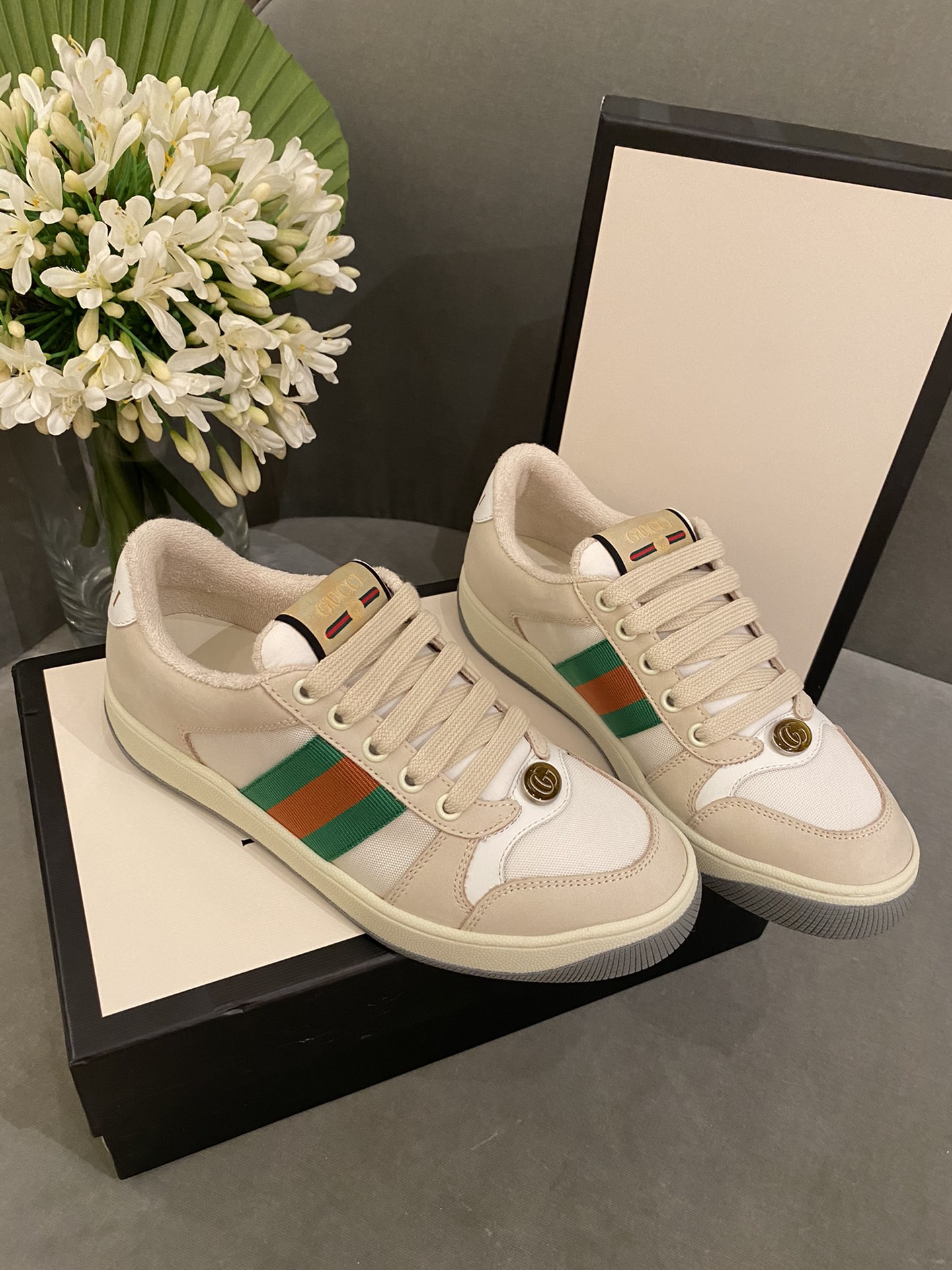 G*u*i sneakers