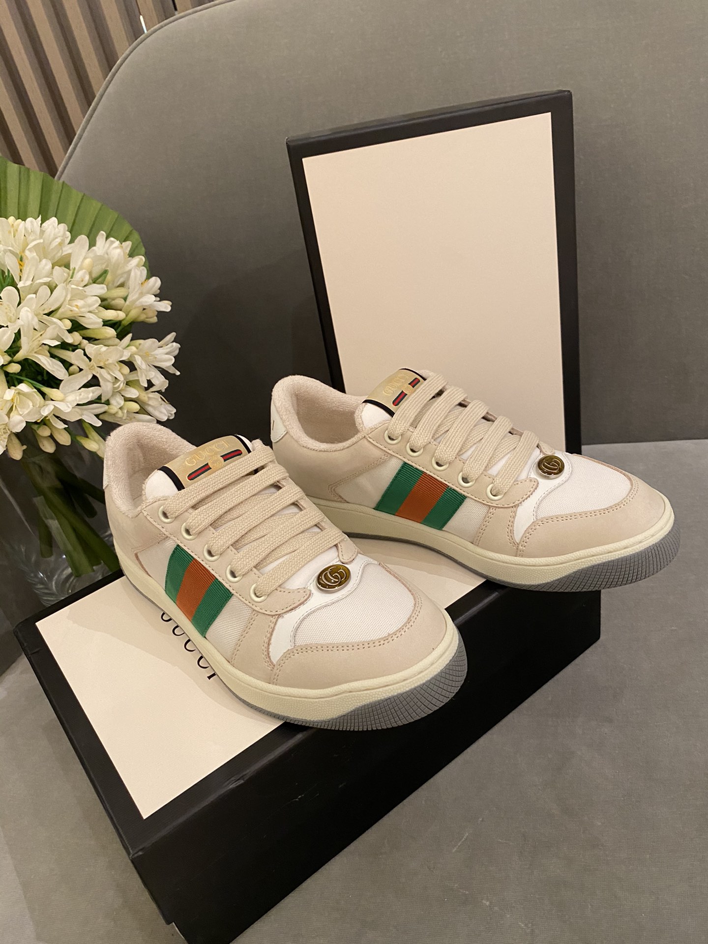 G*u*i sneakers