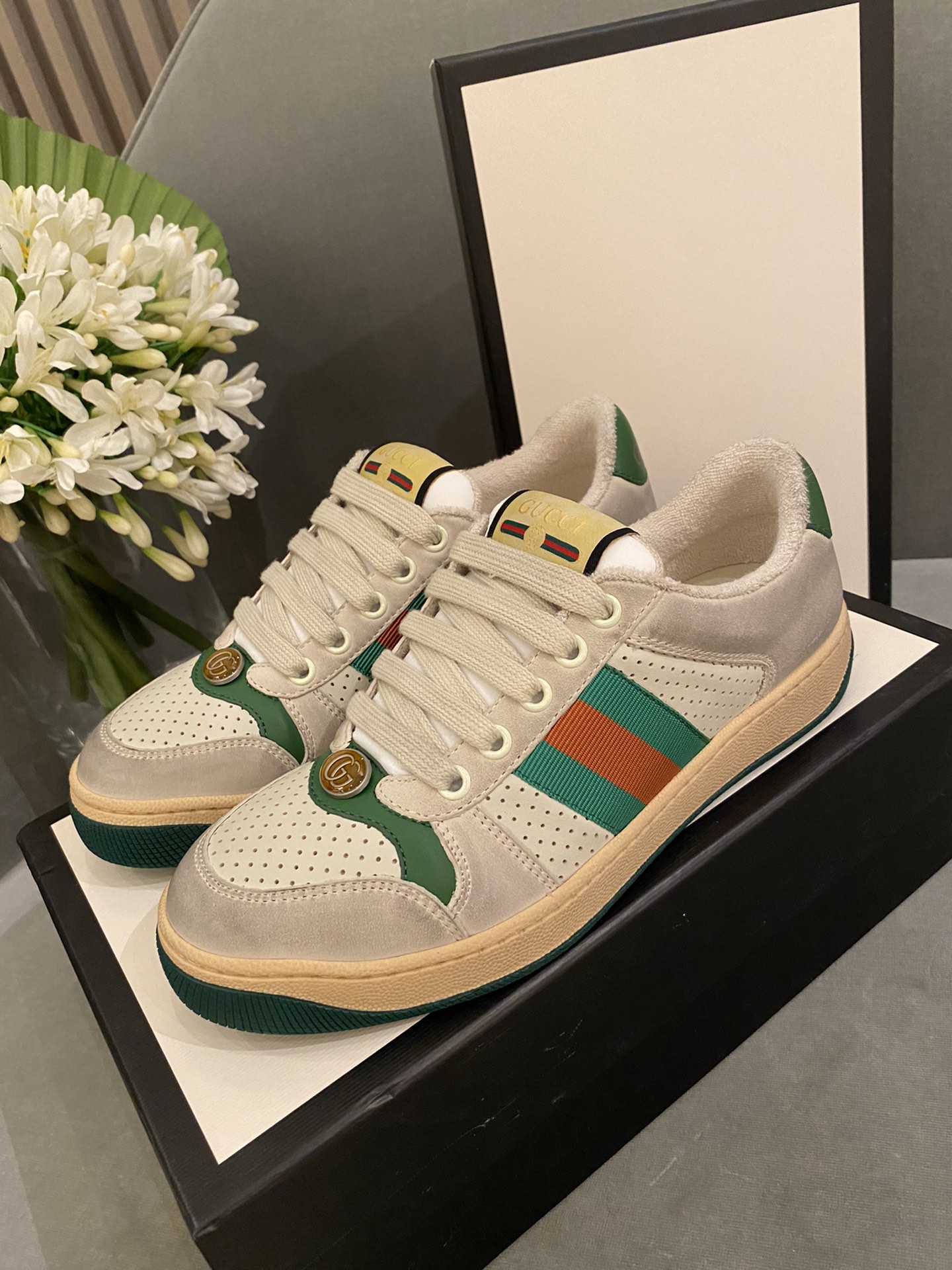 G*u*i sneakers