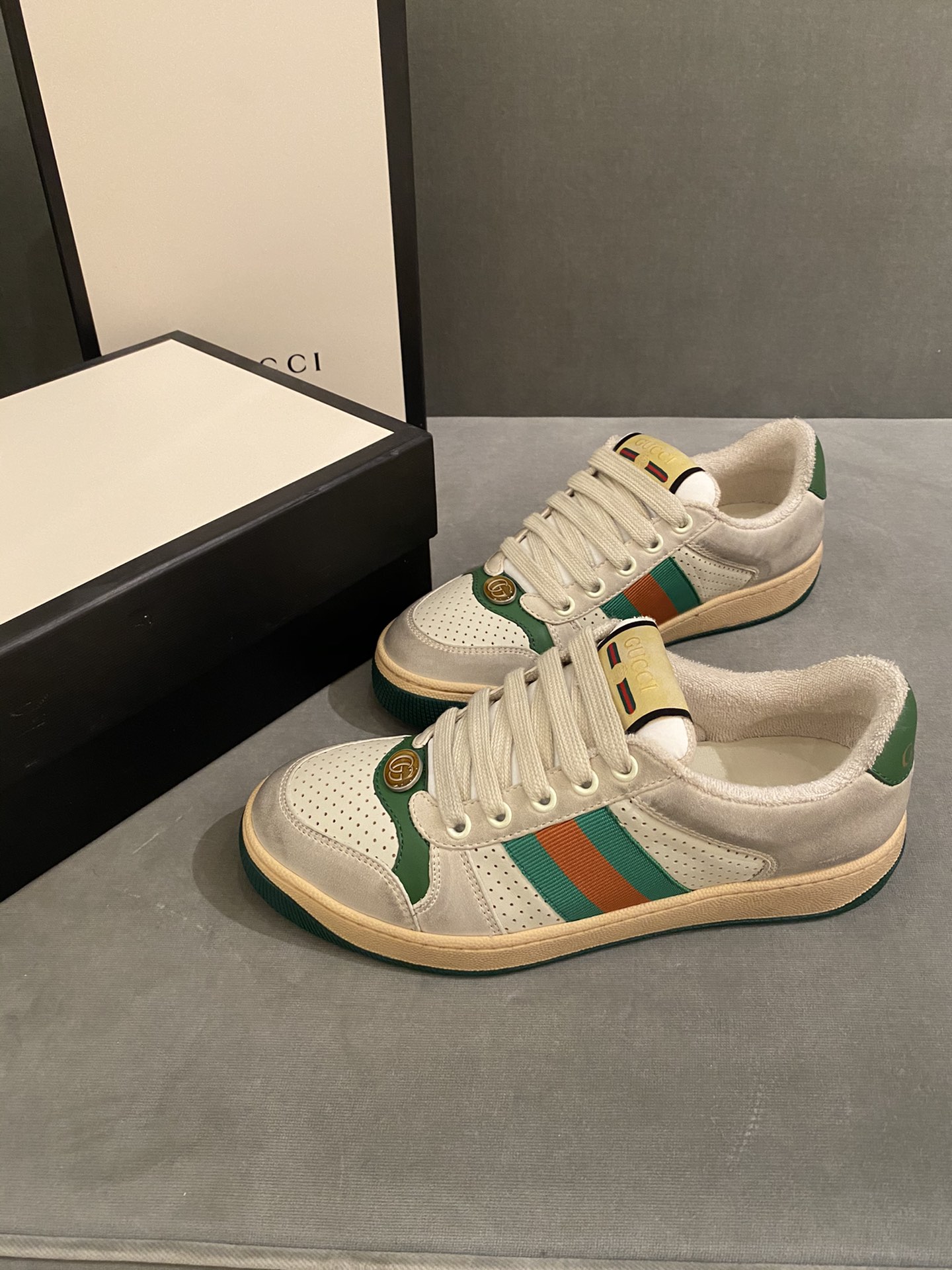 G*u*i sneakers