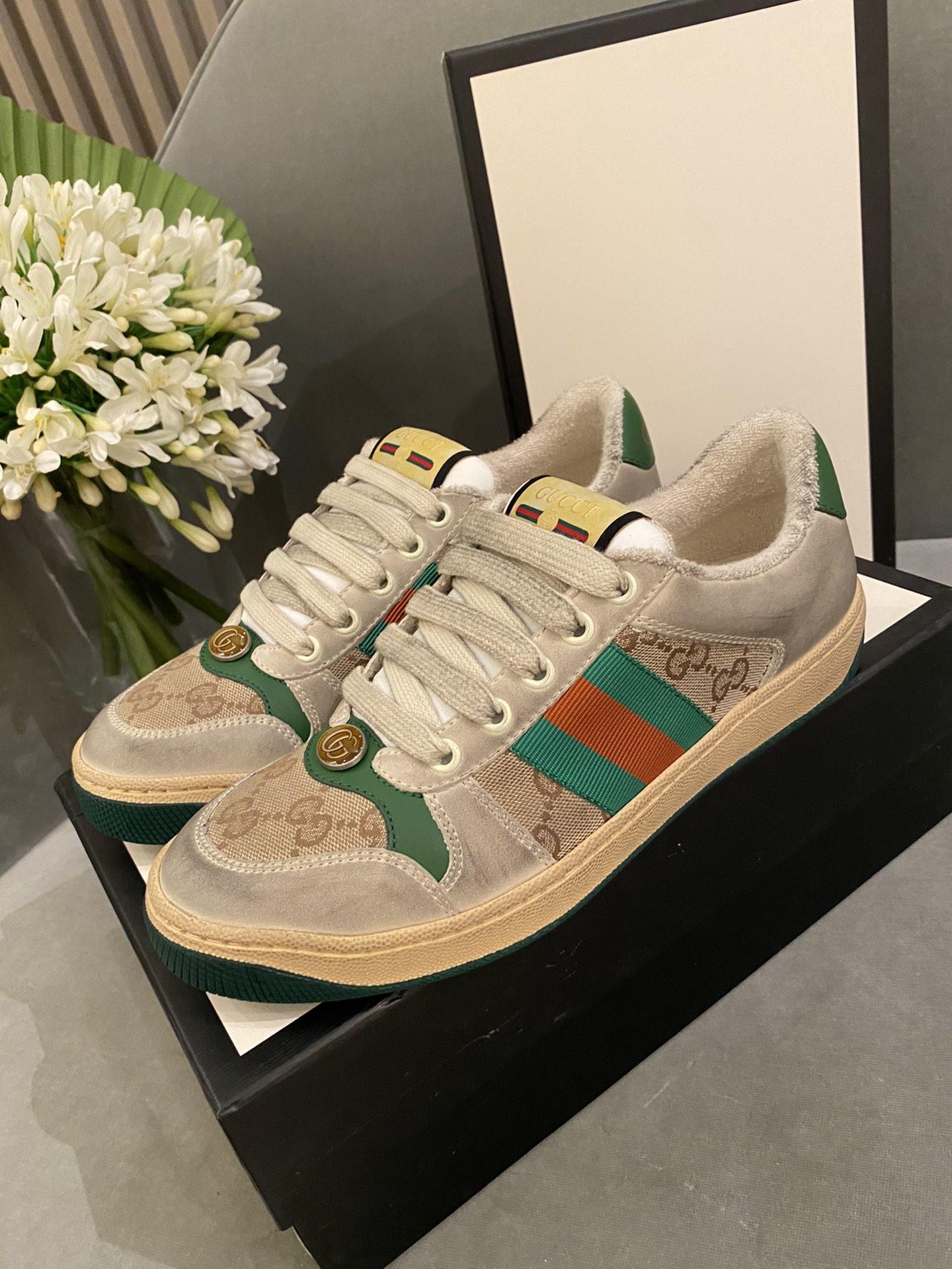 G*u*i sneakers