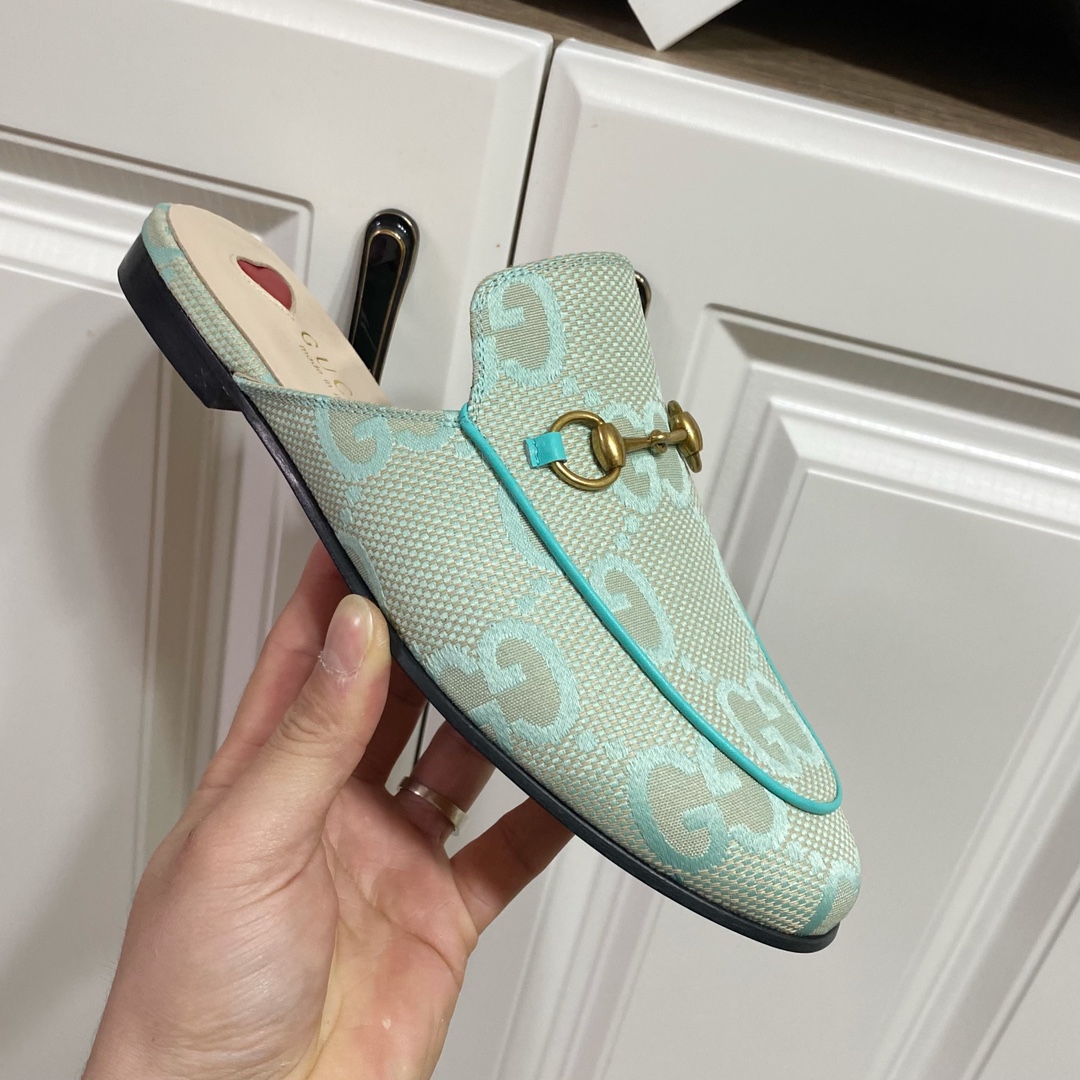 G*u*i loafers