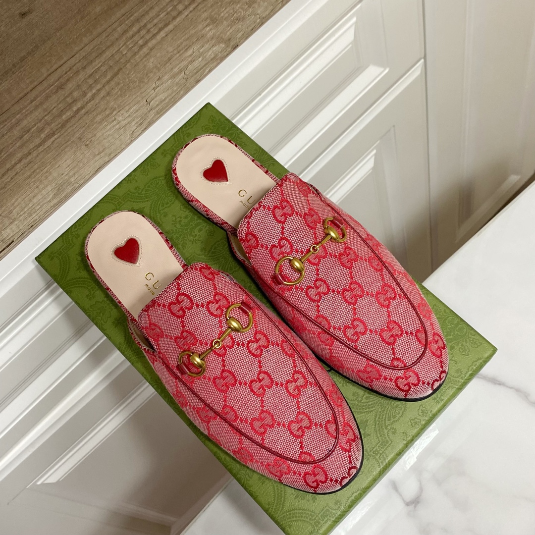 G*u*i loafers