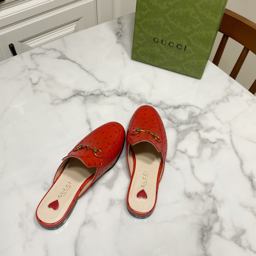 G*u*i loafers