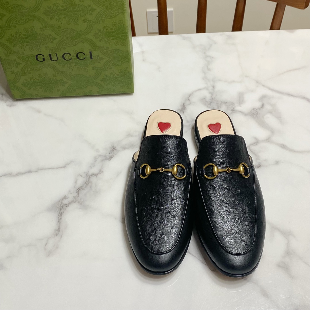 G*u*i loafers