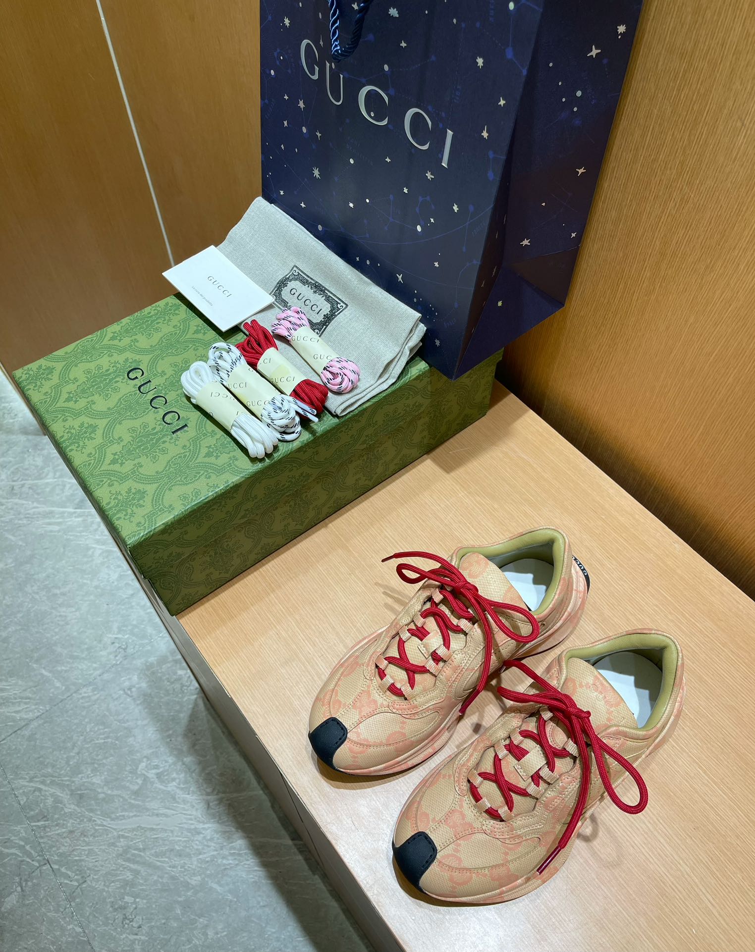 G*u*i sneakers