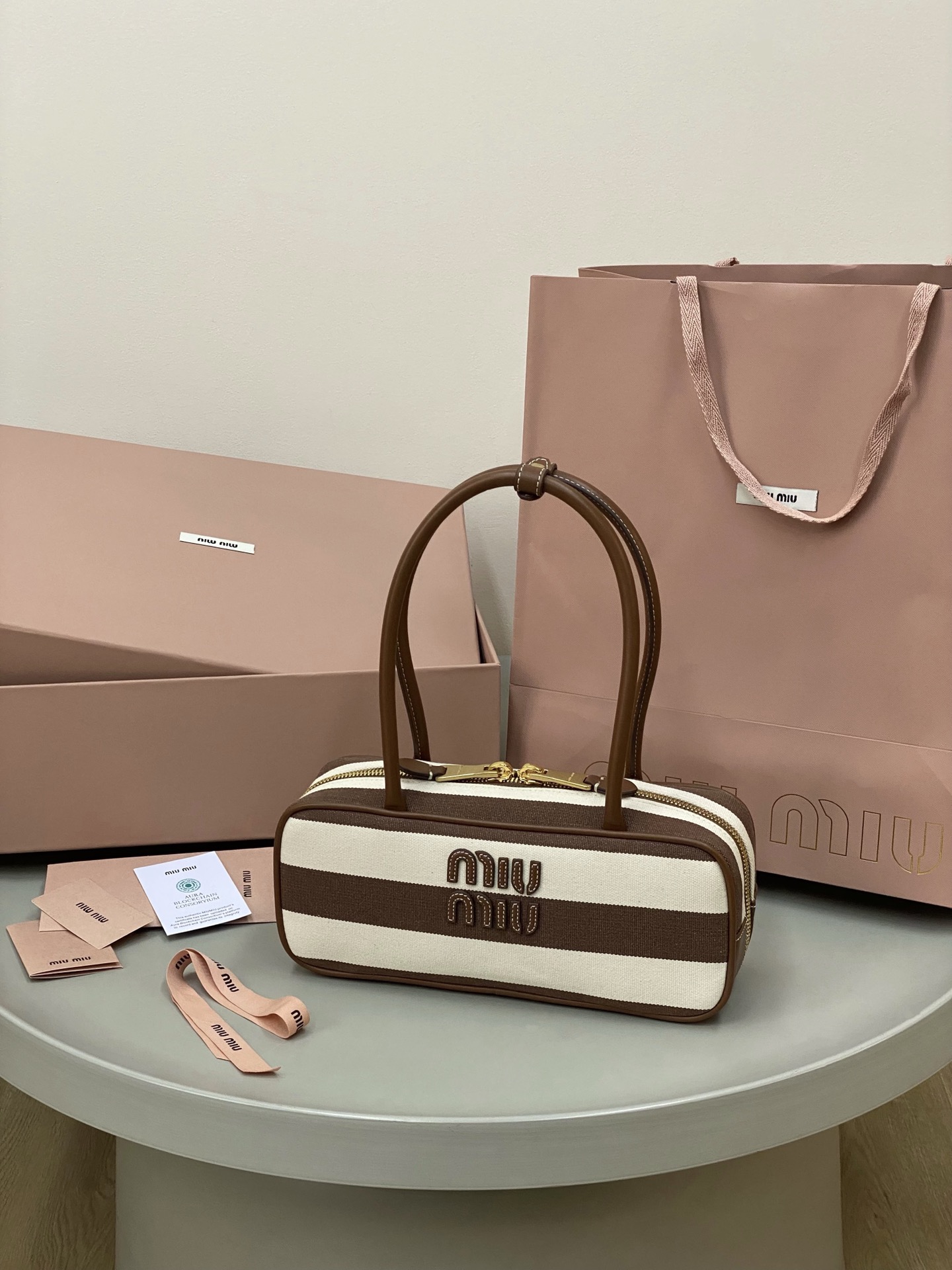 M1um1u beau top-handle tratan bag -27×12×9cm