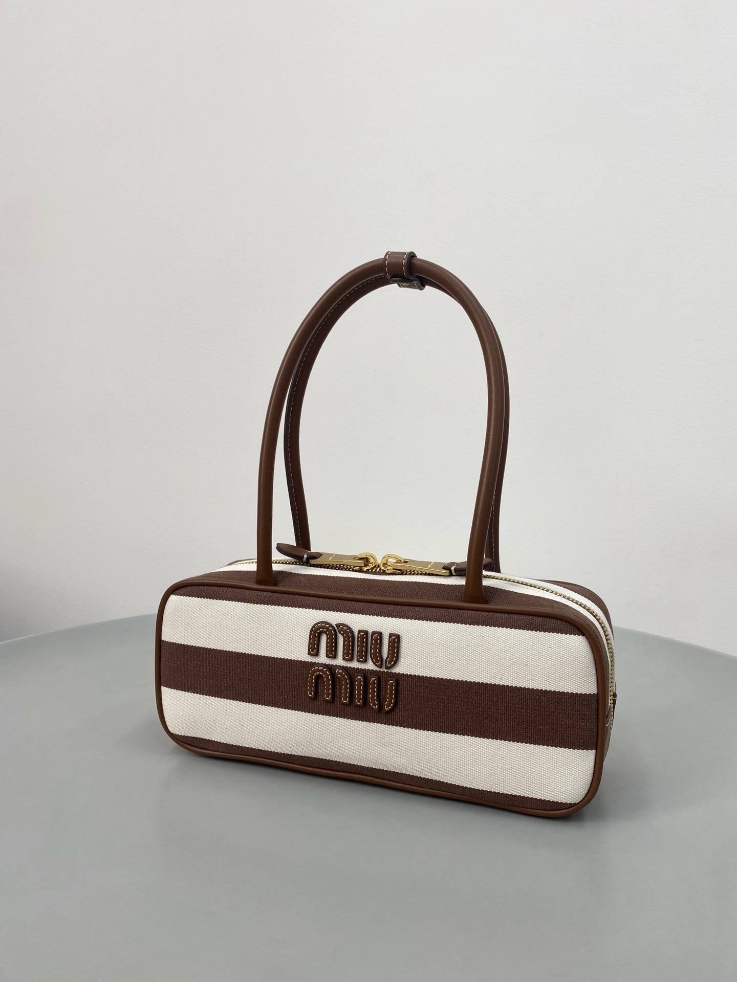 M1um1u beau top-handle tratan bag -27×12×9cm