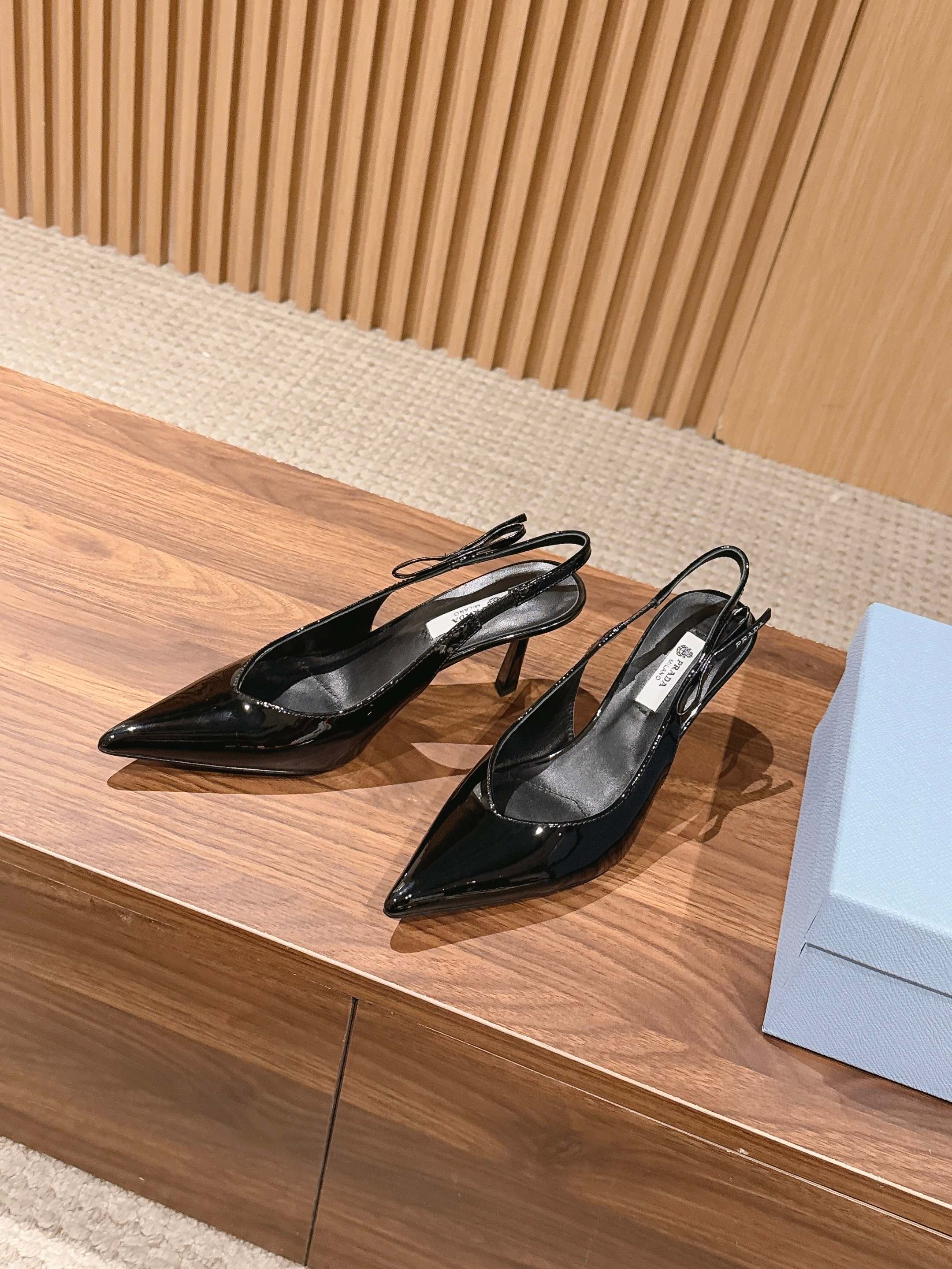 Pra*a Black Patent Leather Slingback Pumps