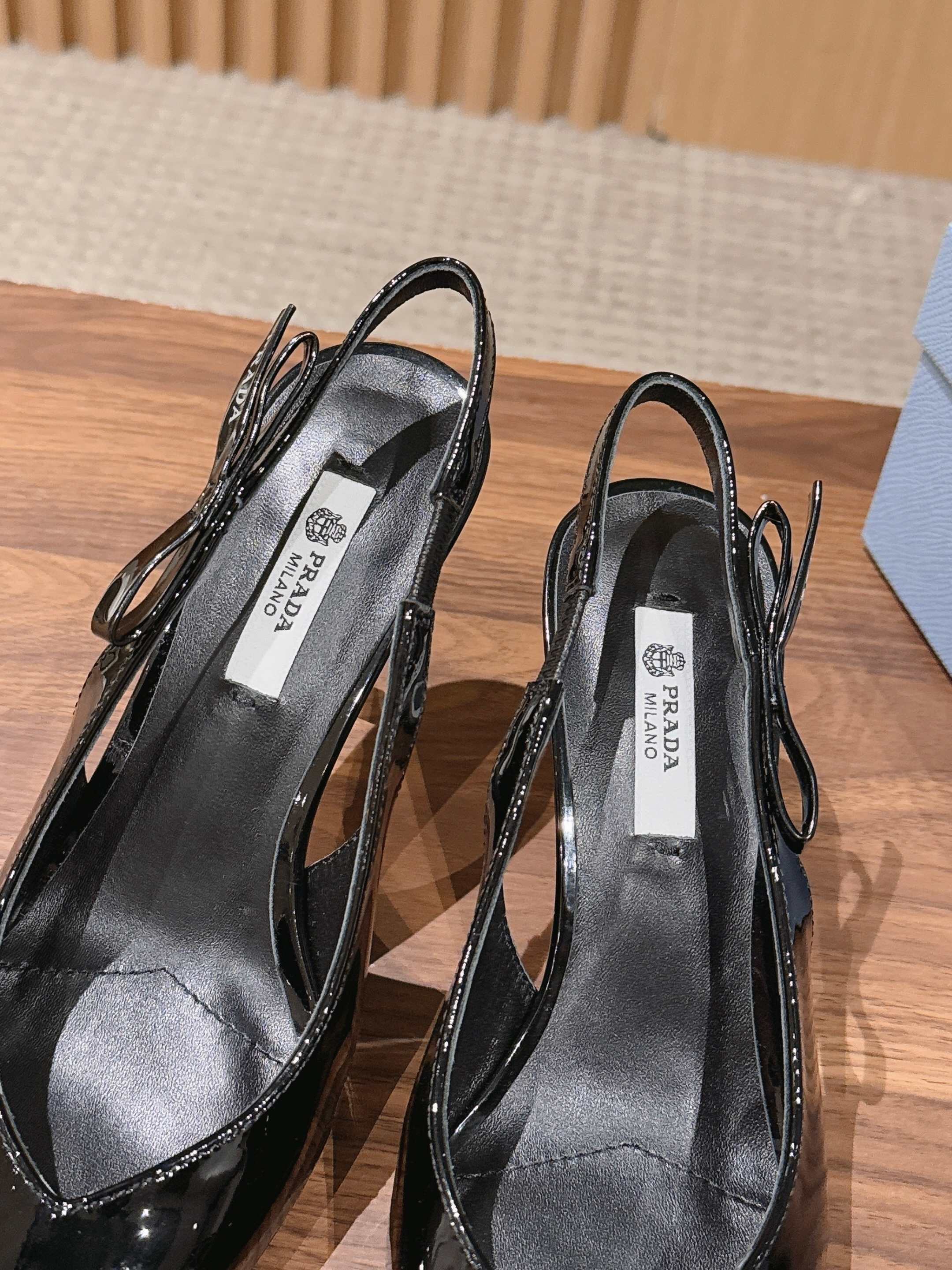 Pra*a Black Patent Leather Slingback Pumps