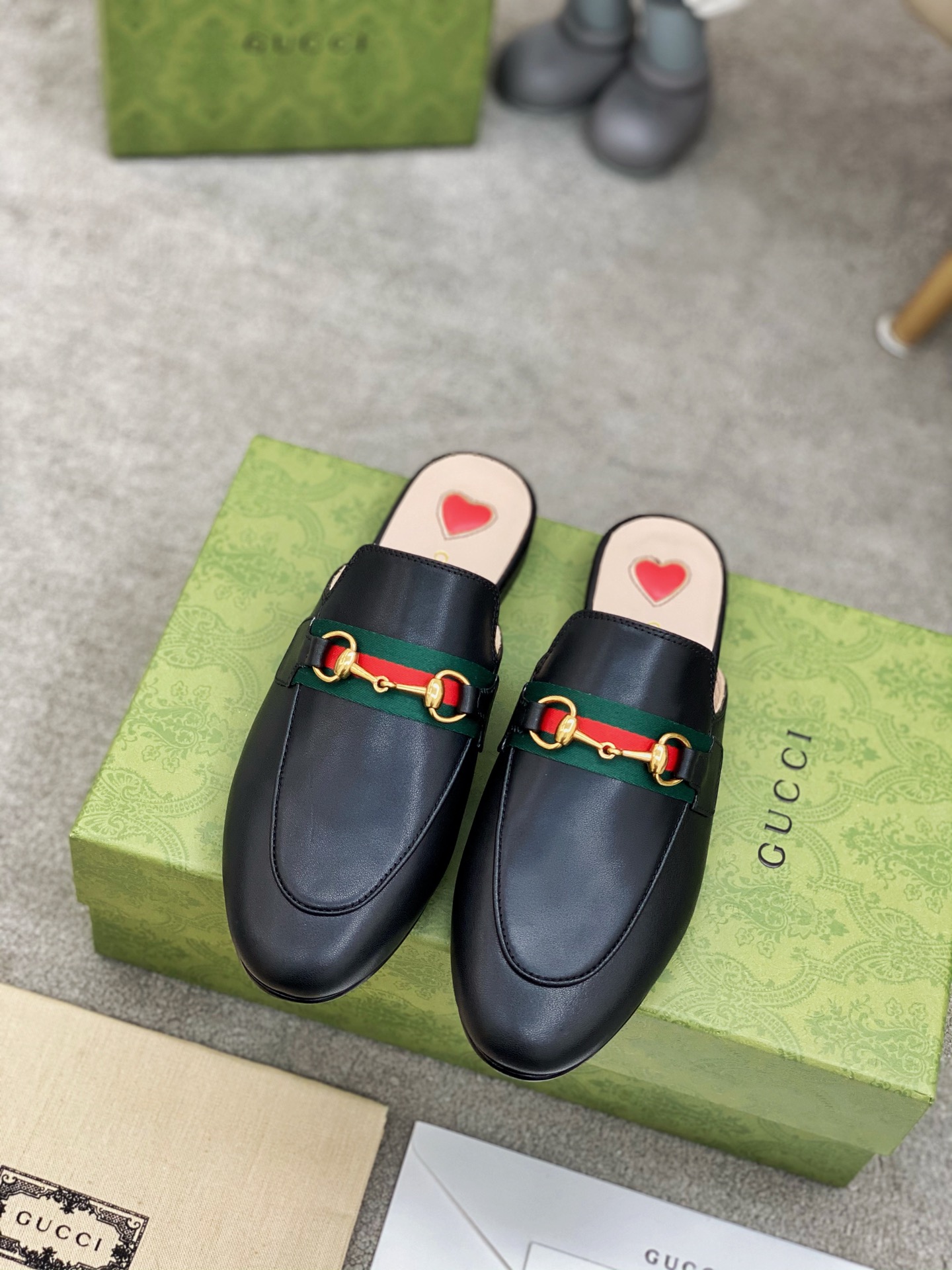 G*u*i loafers