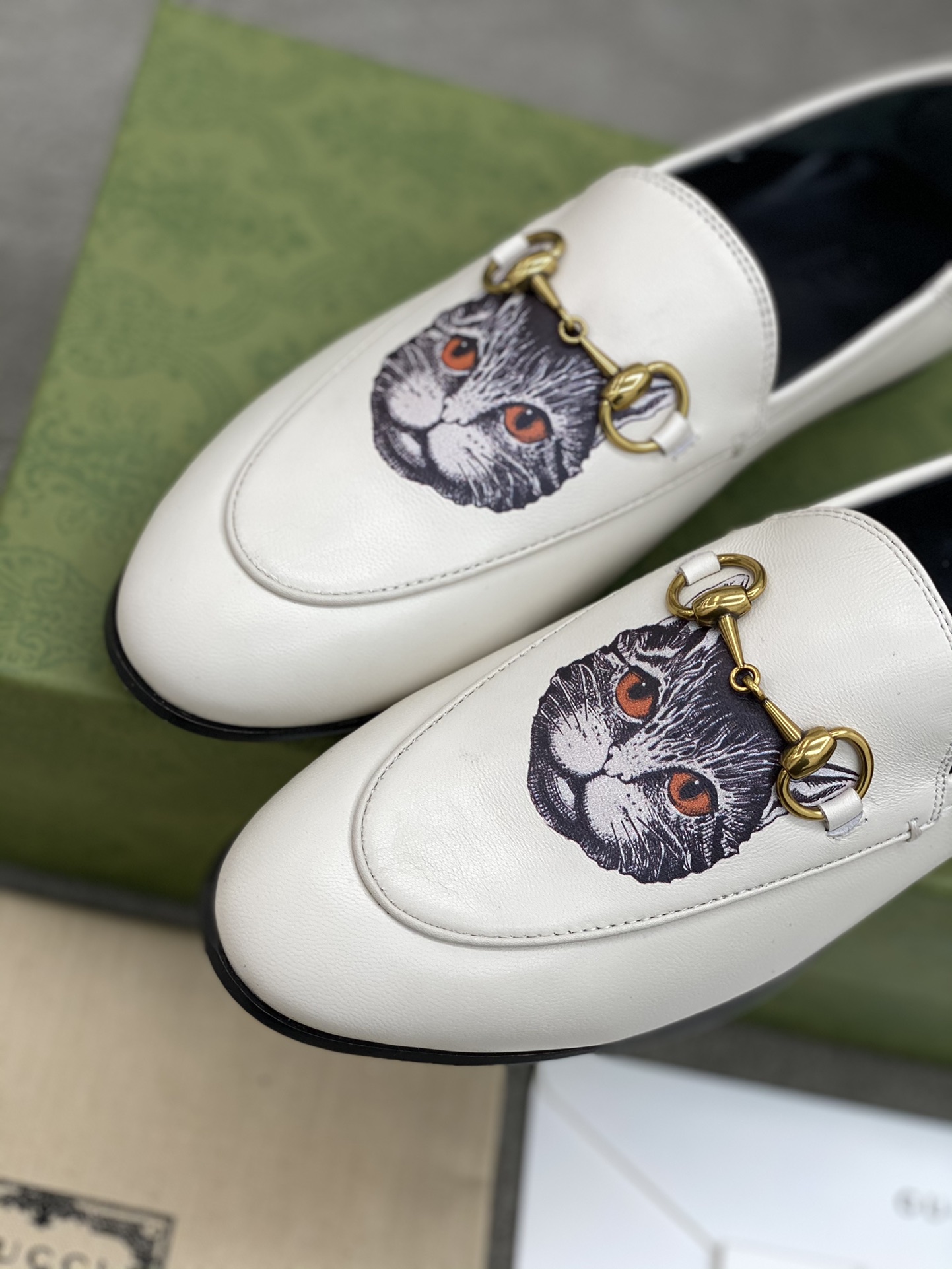 G*u*i loafers
