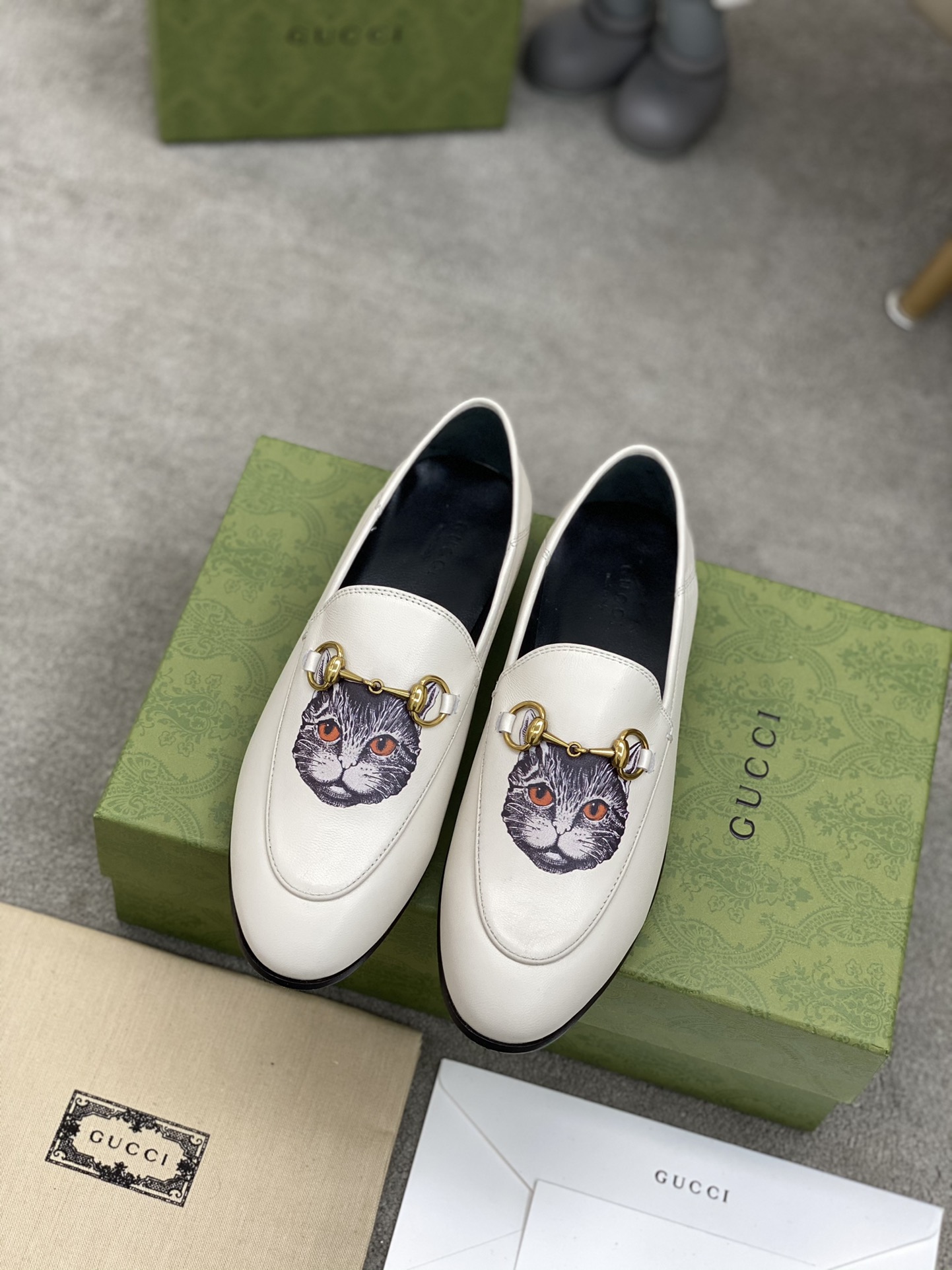 G*u*i loafers