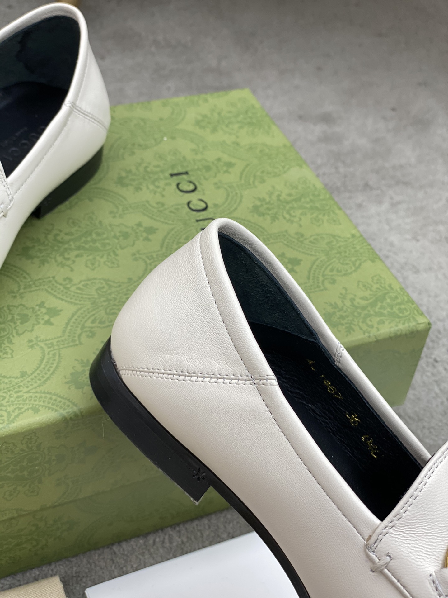 G*u*i loafers
