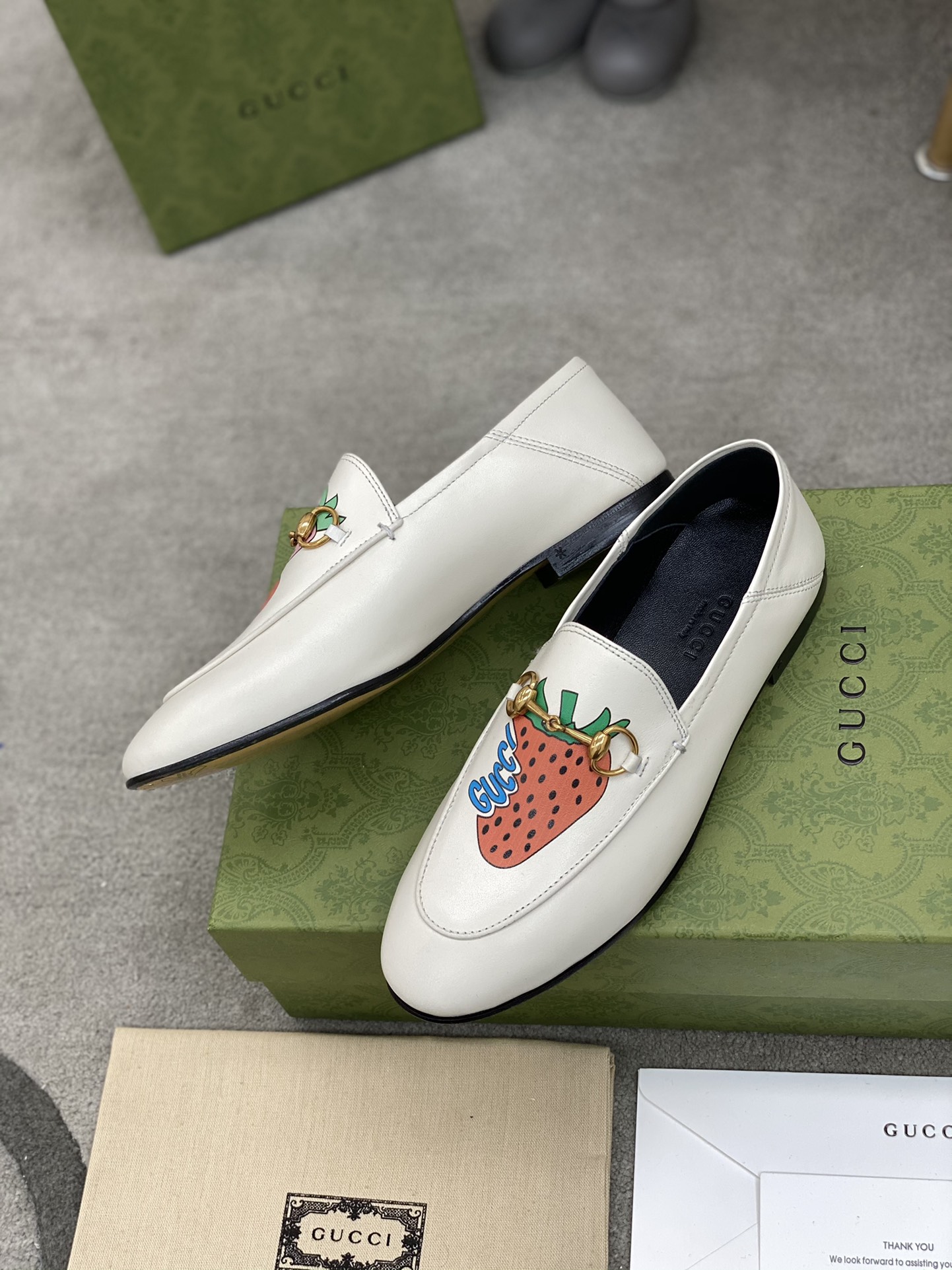 G*u*i loafers