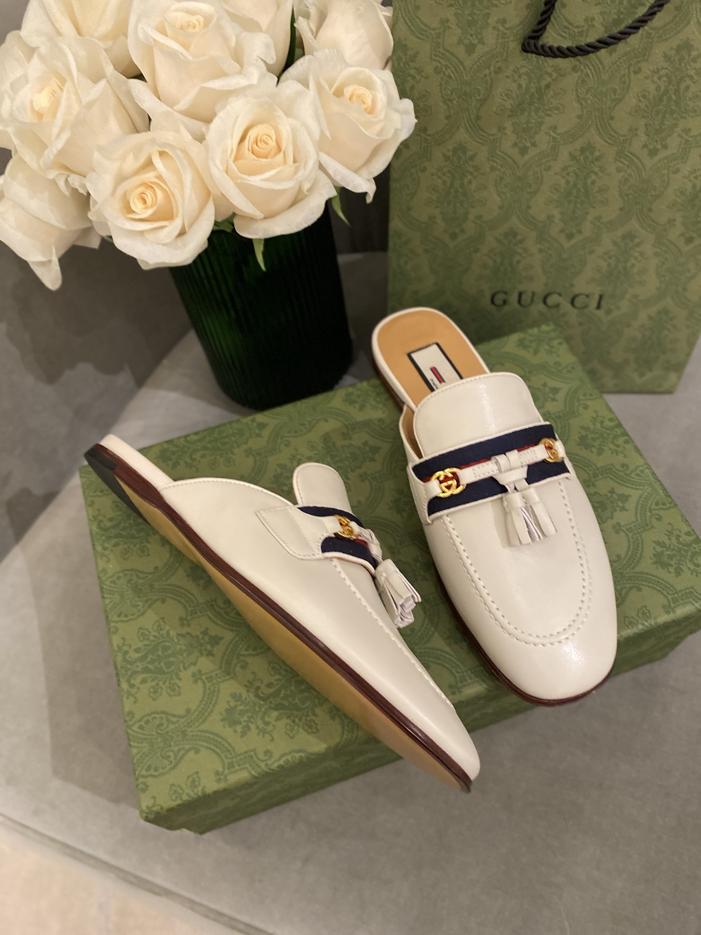 G*u*i loafers