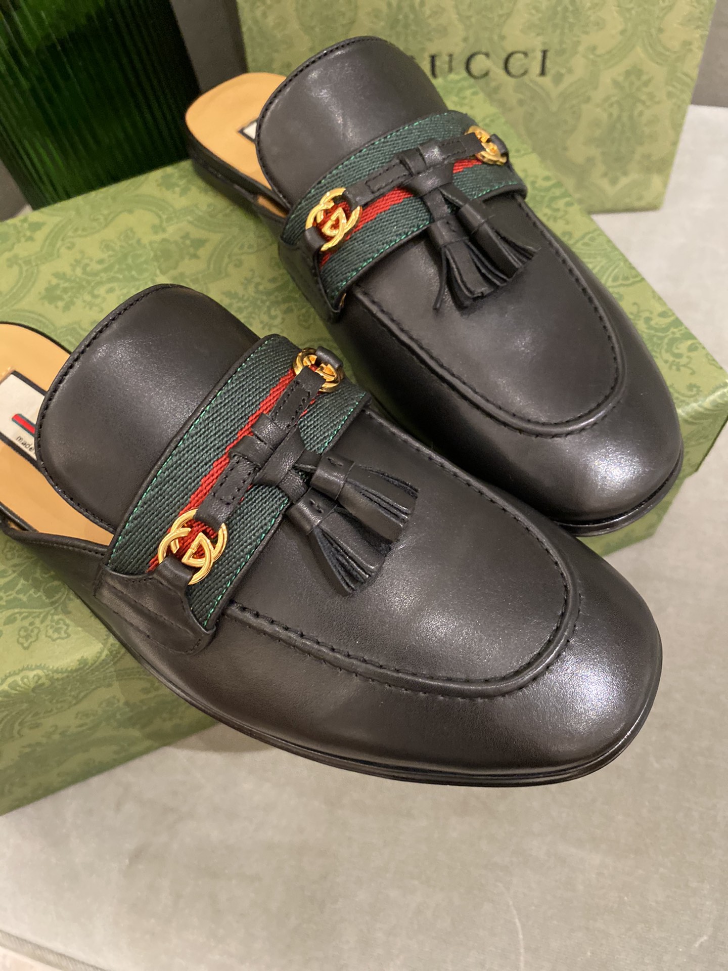 G*u*i loafers