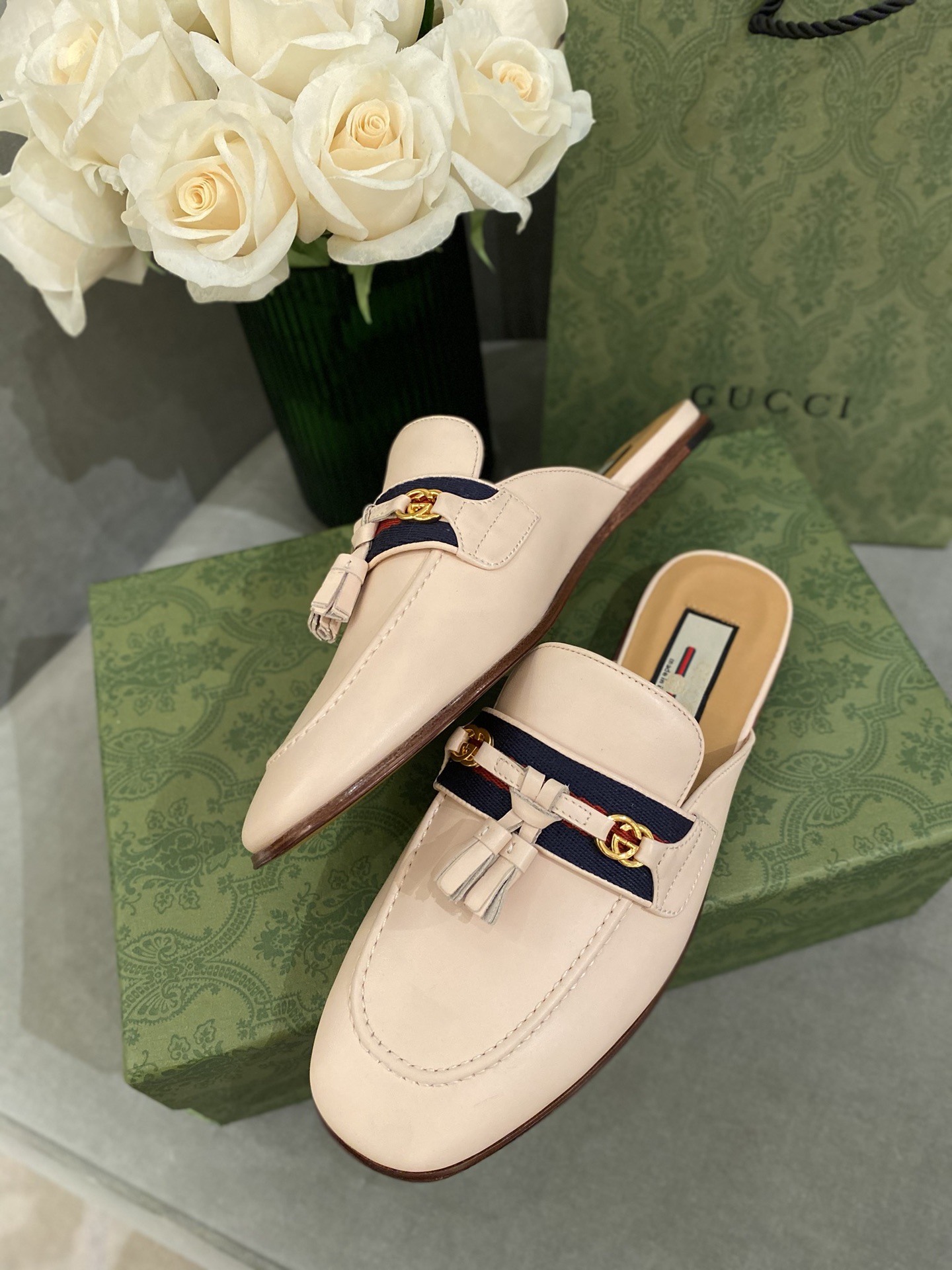 G*u*i loafers