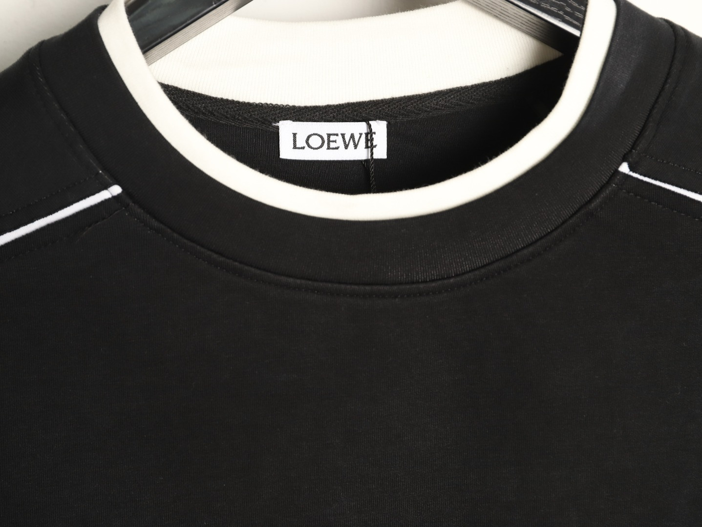 L0ew* Hoodies