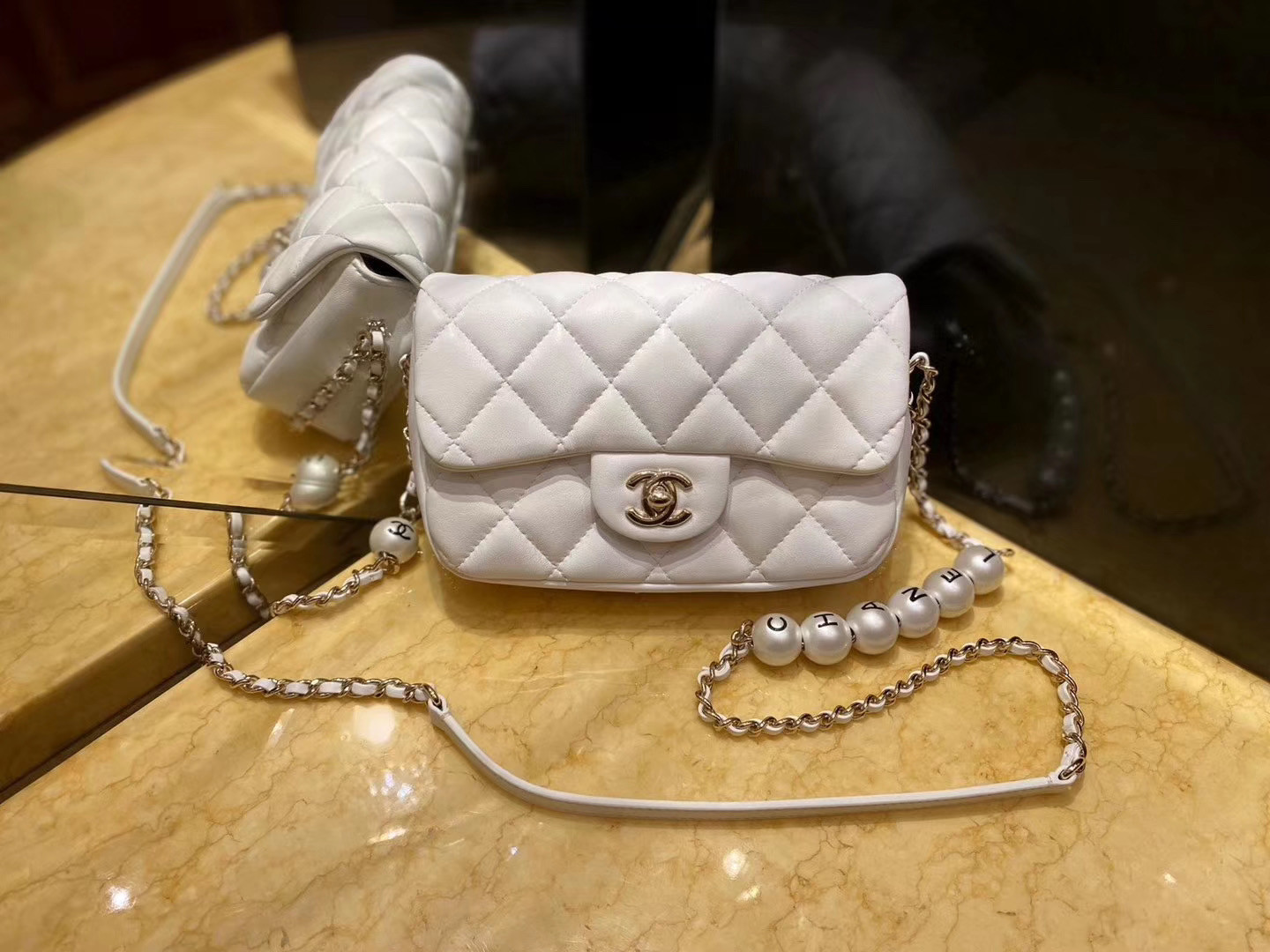 Ch**el small pearl bag in white
