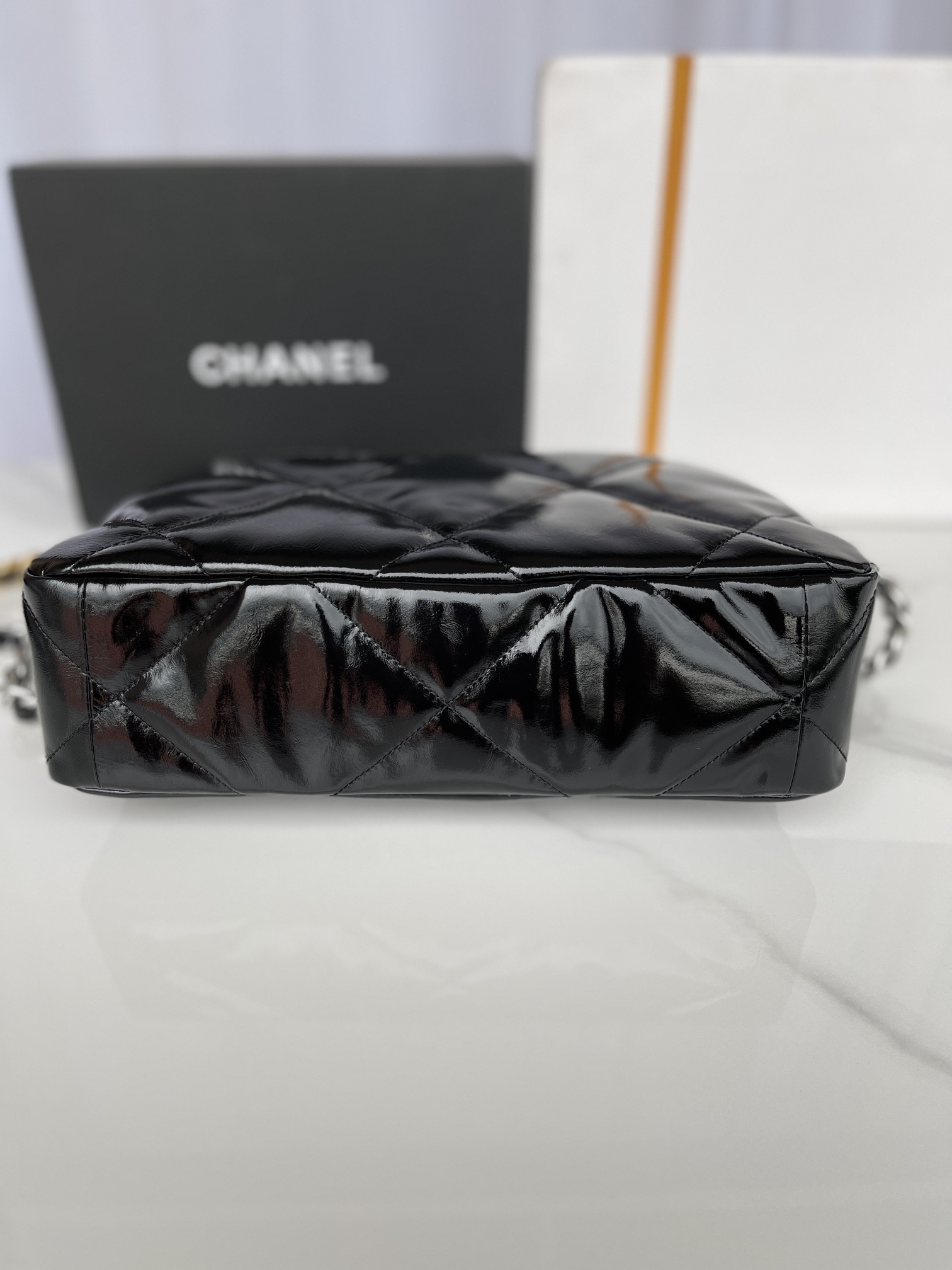 Ch**el 19 LARGE HANDBAG Shiny Leather, Gold-Tone, Silver-Tone & Ruthenium-Finish Metal Black 7.8 × 11.7 × 3.9 in