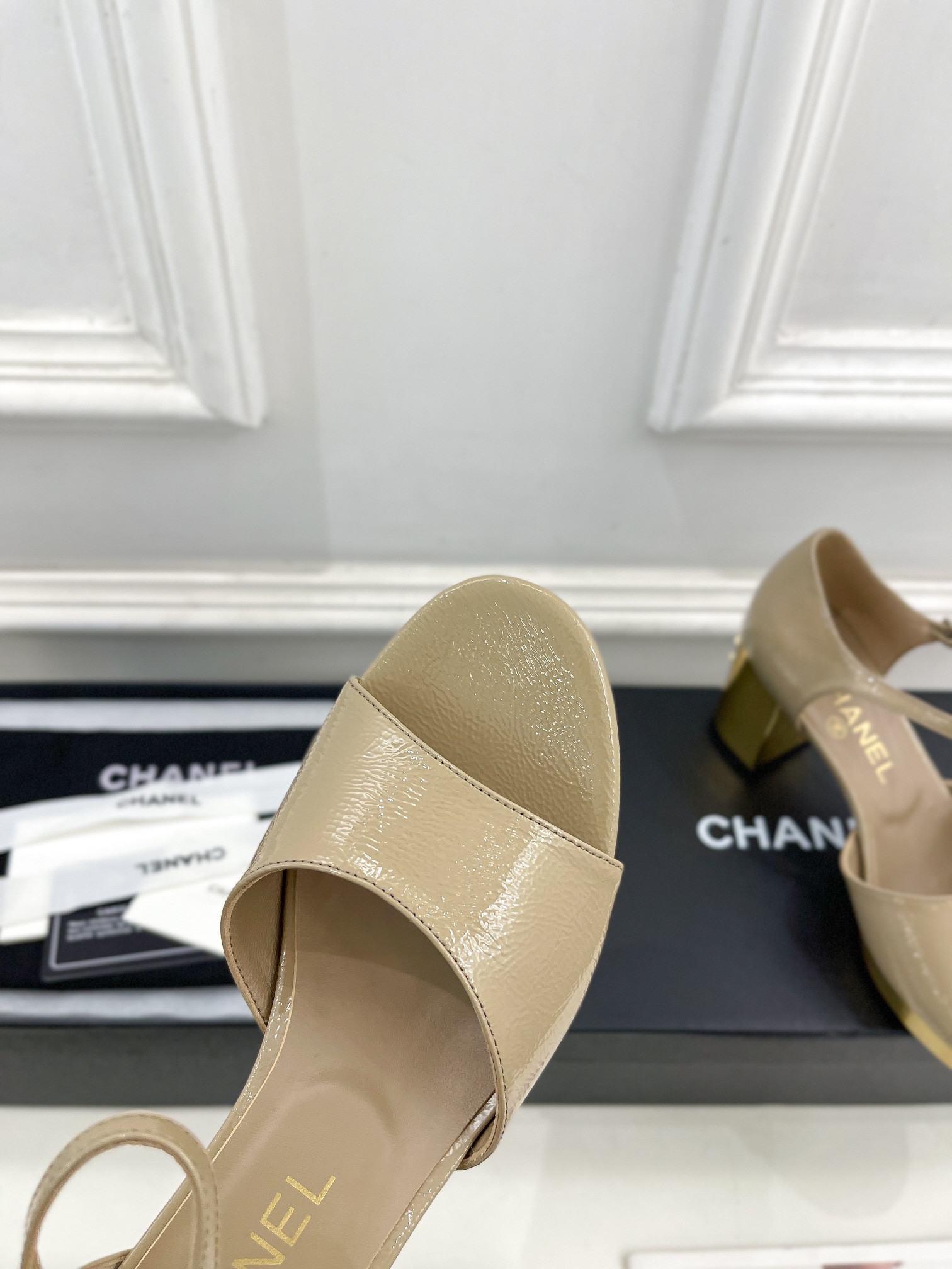 UA Ch**el HEELED SANDALS